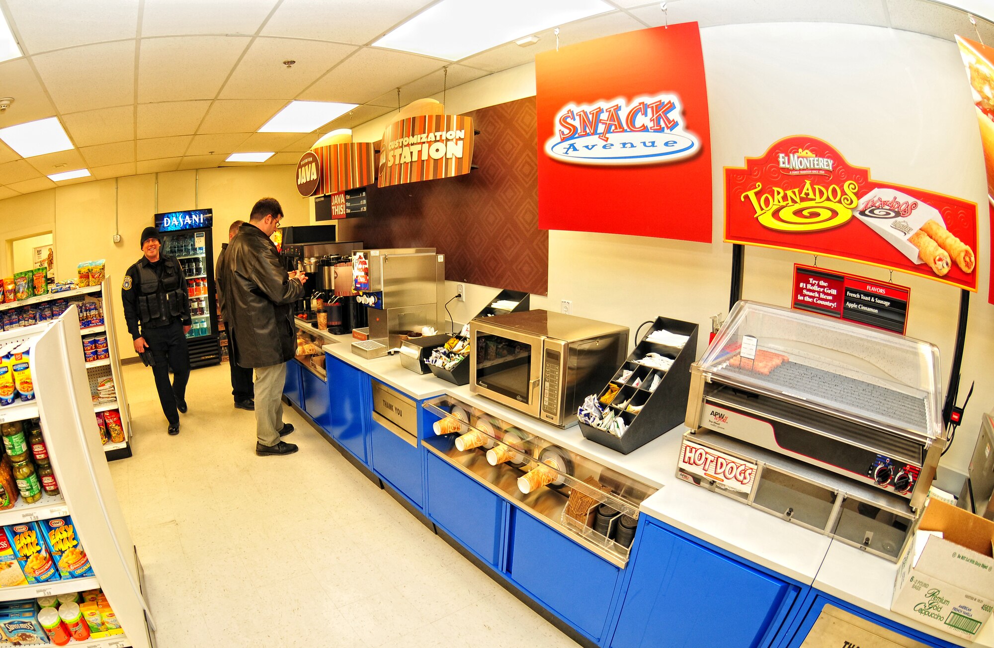 Members of the 914th Airlift Wing, enjoy the new selections at the Base Exchange (BX), December 15, 2009, Niagara Falls Air Reserve Station, NY. The BX now has hot dogs and coffee available during the day as part of an expansion of services available to those serving at the Niagara Falls Reserve Station.  (U.S. Air Force photo by Staff Sgt. Joseph McKee)