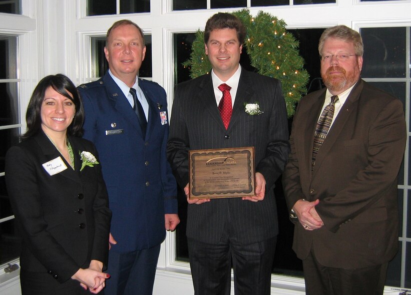 YOUNGSTOWN,N.Y.- From left to right, Molly Fitzpatrick, Executive Director of Leadership Niagara, Col. Allan Swartzmiller, 914th Airlift Wing Commander, Jerry Slipko, 914th Services Marketing Director, and Skip Helfrich, Class Moderator from Human Energies pose for a graduation photo.  Mr. Slipko was the 914th Airlift Wing Representative for the 2009 Leadership Niagara Class.Photo by 914th AW/PA.