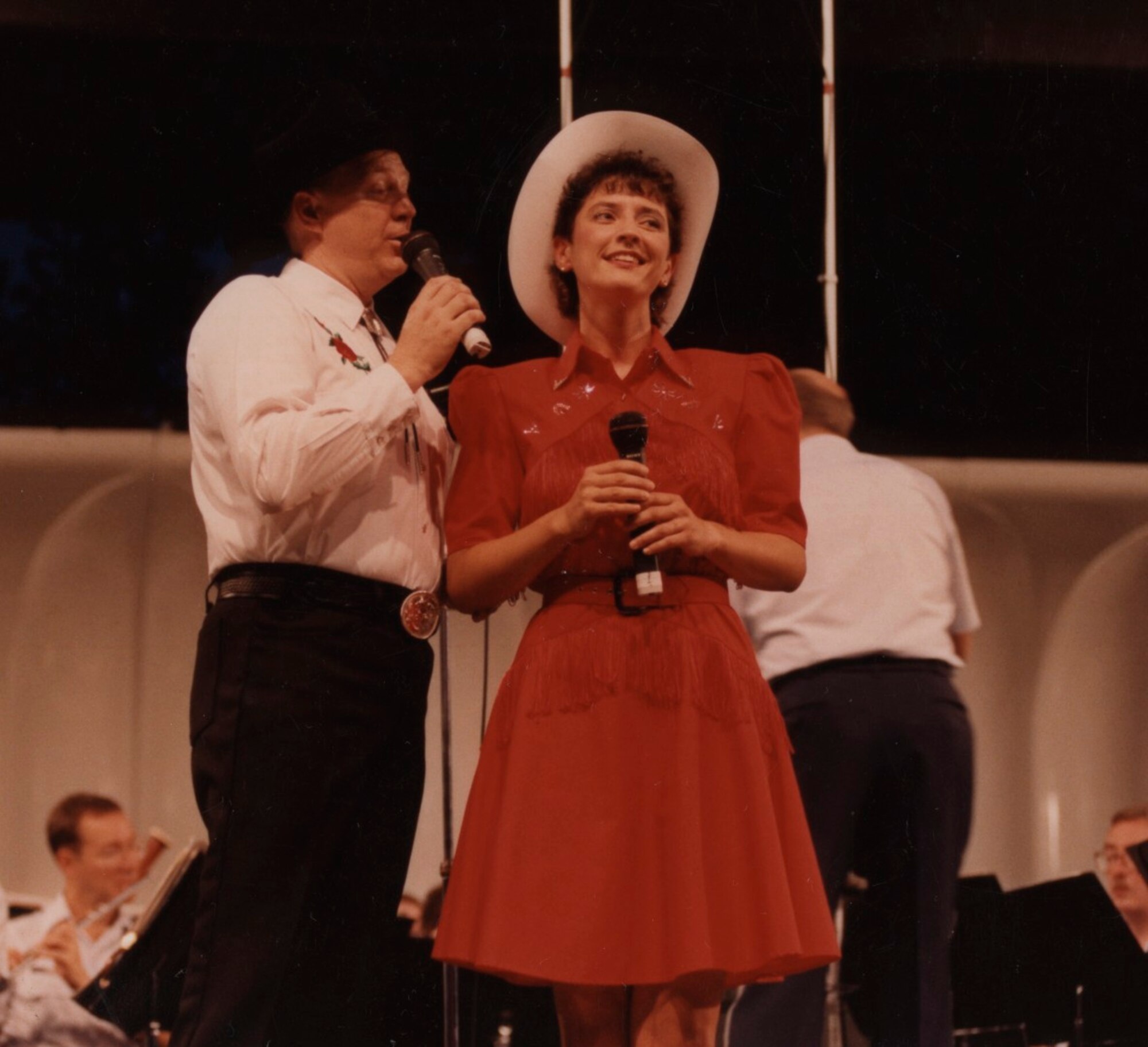 Master Sgt. Richard Pearson and Technical Sgt. Kelly Egan performing with The USAF Band at the Sylvan Theater, Washington, D.C.   If you have any additional behind-the-scenes stories from these events or memories to share, please email Band Historian <a href="mailto:usafbandhistorian@afncr.af.mil">Technical Sgt. Tracey MacDonald</a>.  (Note: Rank is from the time the photograph was taken)  This is Photo 24.  (Unknown Photographer)