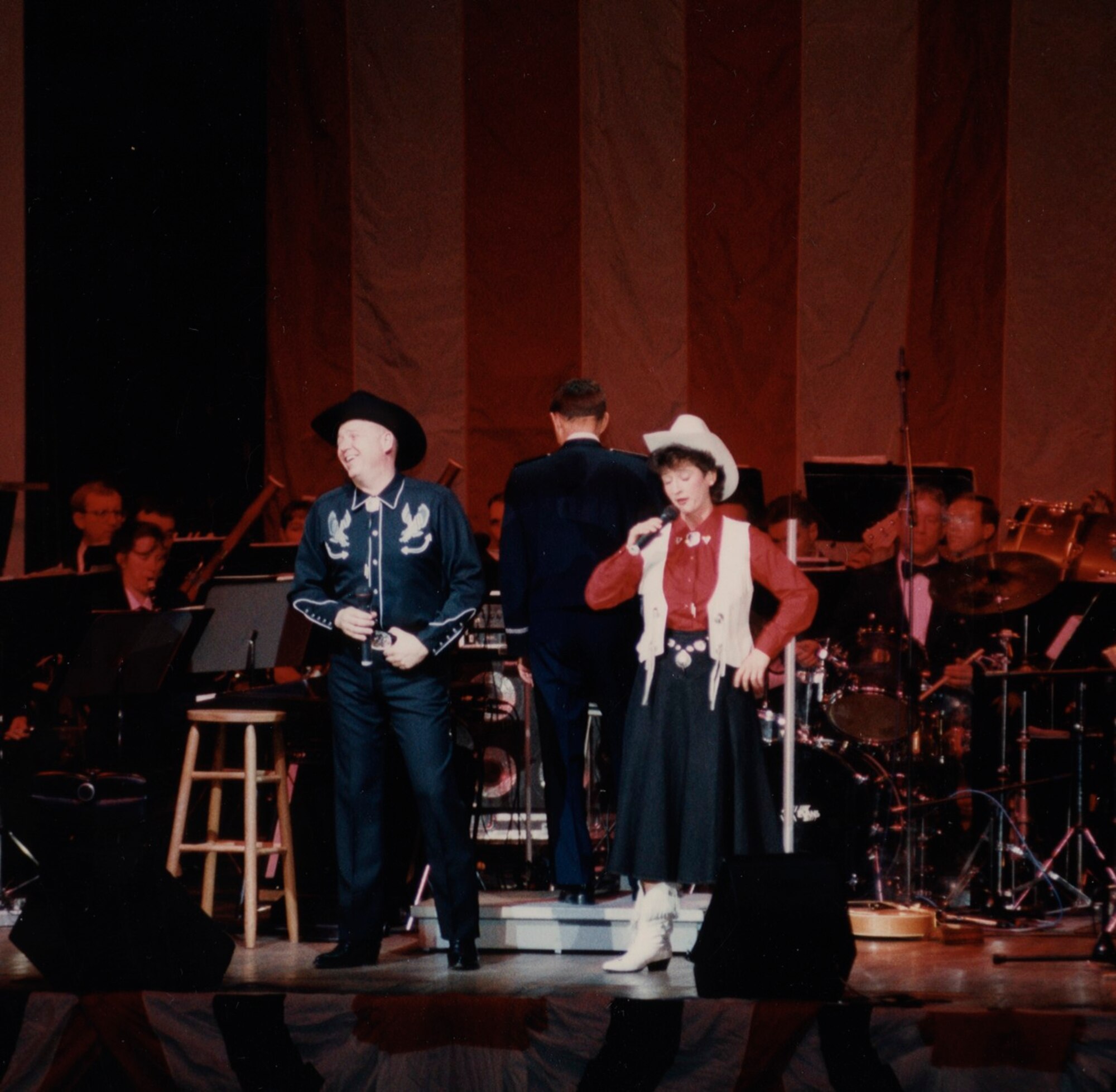 Master Sgt. Richard Pearson and Technical Sgt. Kelly Egan performing with The USAF Band at Daughters of the American Revolution Constitution Hall, Washington, D.C.   If you have any additional behind-the-scenes stories from these events or memories to share, please email Band Historian <a href="mailto:usafbandhistorian@afncr.af.mil">Technical Sgt. Tracey MacDonald</a>.  (Note: Rank is from the time the photograph was taken)  This is Photo 23.  (Unknown Photographer)