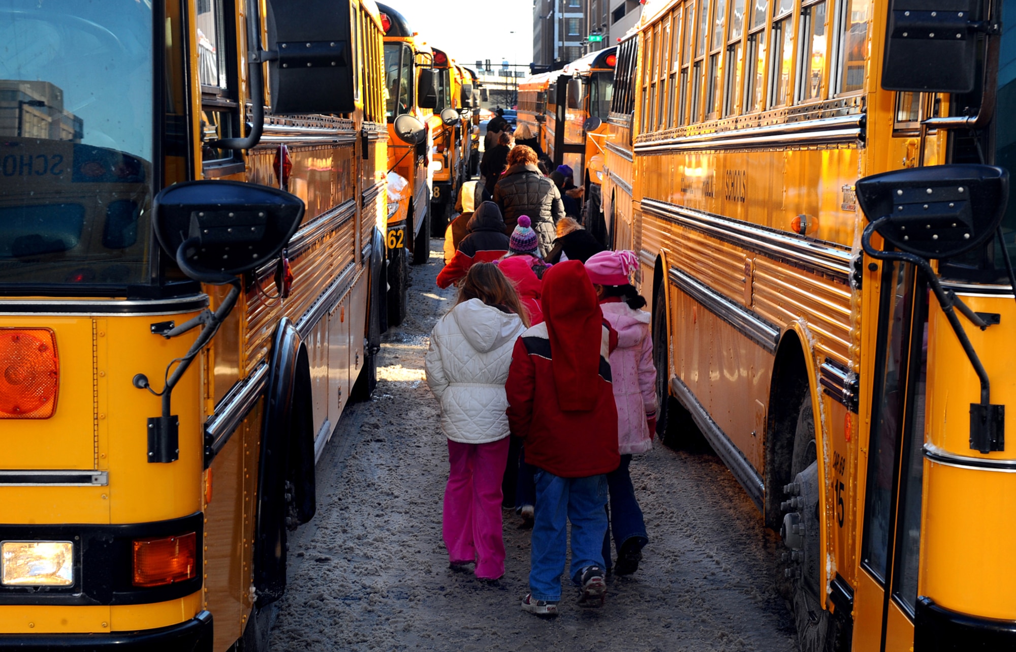 OFFUTT AIR FORCE BASE, Neb. - Elementary school students from the Omaha metro area walk back to their buses following the Heartland of America Band's annual holiday children's concert Dec. 11 at the Holland Performing Arts Center in Omaha, Neb. The annual concert series consisted of six concerts over  four days. U.S. Air Force Photo by Josh Plueger
