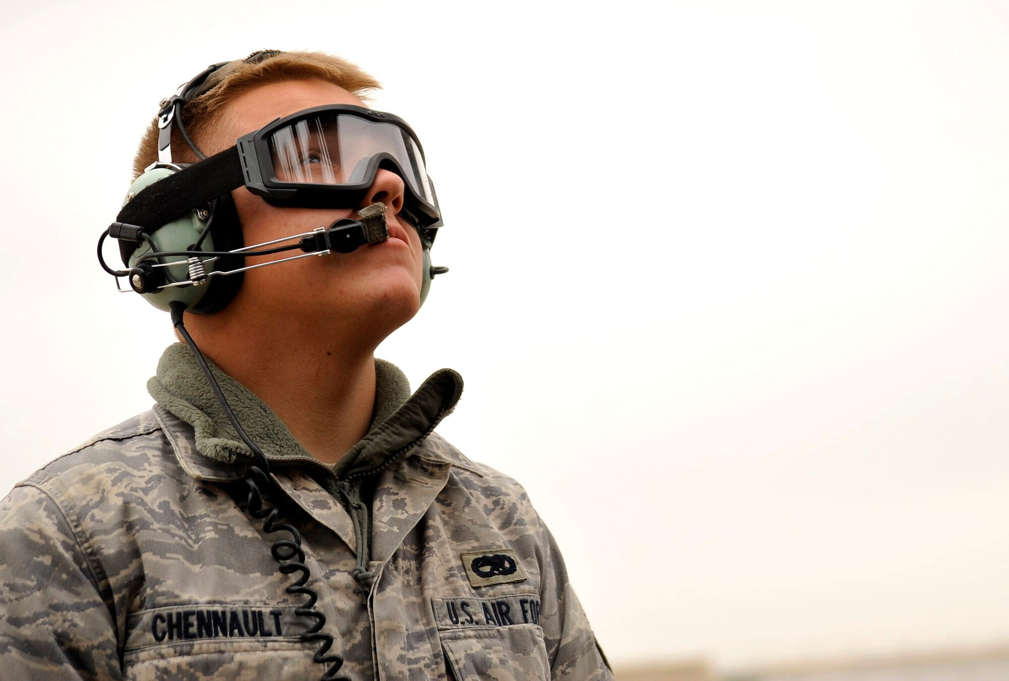 Airman 1st Class William Chennault looks at the main rotor blades of an HH-60G Pave Hawk Dec. 8, 2009 at Camp Bastion, Afghanistan. This inspection ensures the HH-60G did not receive any damage while picking up a patient. Airman Chennault is a 451st Air Expeditionary Squadron crew chief. (U.S. Air Force photo/Staff Sgt. Angelita Lawrence) 