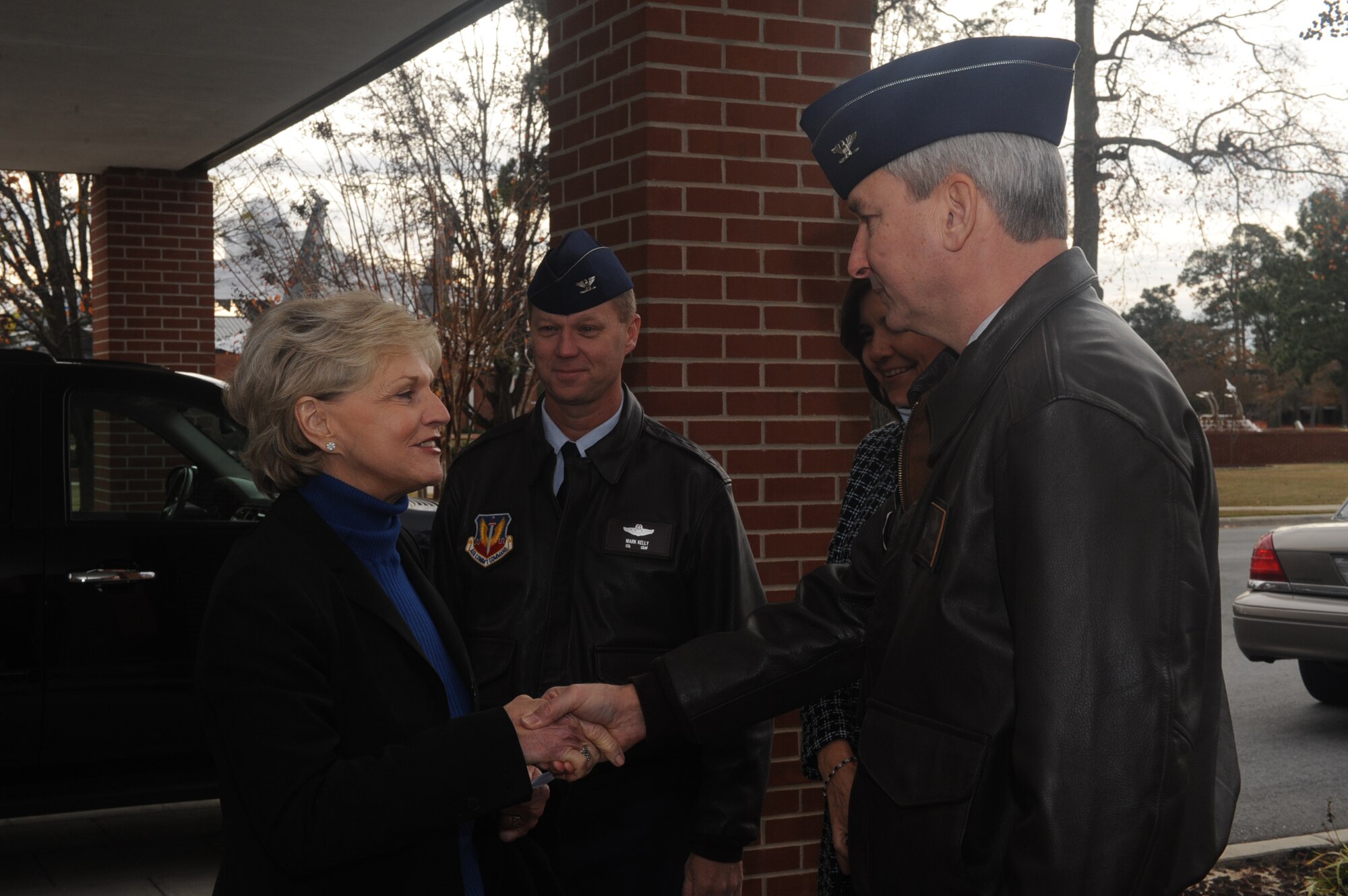 Col. Fritz Linsenmeyer, commander of the 916th Air Refueling Wing, Air Force Reserve, greets Gov. Bev Perdue during a visit to Seymour Johnson on Dec. 11. Gov. Perdue was on-base to deliver a press conference regarding education, but also took time to visit with military families assigned to the 4th Fighter Wing. (U.S. Air Force photo by SSgt. Courtney Richardson, 4FW/PA)
