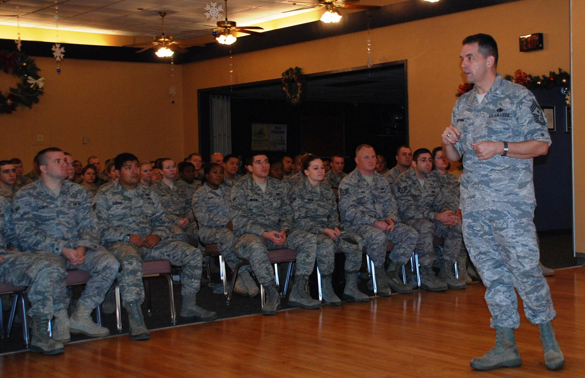 LAUGHLIN AIR FORCE BASE, Texas – Chief Master Sgt. Robert Tappana, command chief master sergeant of Air Education and Training Command, speaks to a large group of Laughlin’s enlisted members at Club Amistad here Dec.3. Some topics Chief Tappana covered were the Air Force’s new physical training program and current deployment operations. (U.S. Air Force photo by Airman 1st Class Blake Mize)