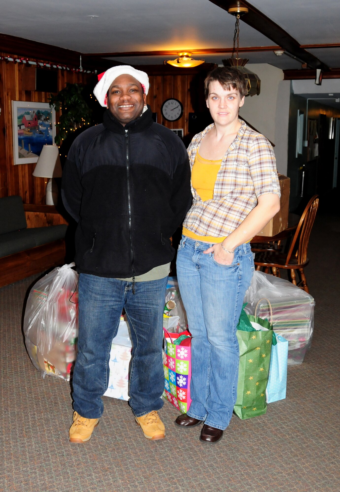 NIAGARA FALLS AIR RESERVE STATION, NIAGARA FALLS, NY--Staff Sgt Everett Myrick, 914 Airlift Wing, delivers gifts to Community Missions of Niagara Frontier, Inc. The gifts were  donated to families in need this holiday season. (U.S. Air Force photo by Staff Sgt Stephanie Clark) (released)