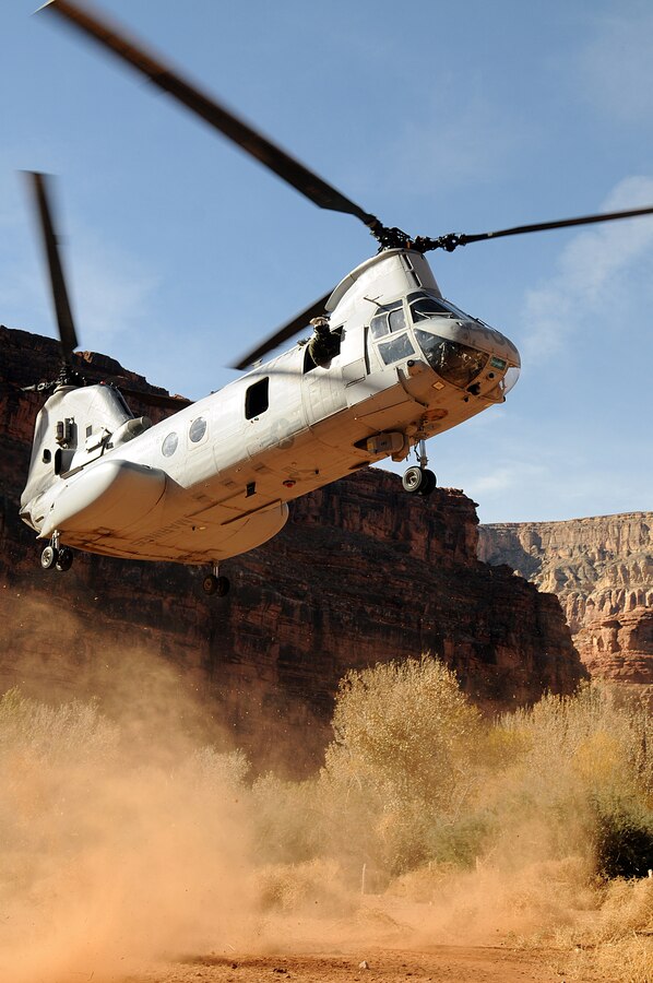 A CH-46E Sea Knight helicopter from Marine Medium Helicopter Squadron 764 lands at the Havasupai Native American village on the Grand Canyon floor Dec. 15, 2009. The squadron flew into the canyon to bring toys and food to the village for the holidays. The next day, the squadron flew back down to the village to bring the guest of honor, Santa Claus, to the toy giveaway event. The reserve squadron, based at Edwards Air Force Base north of Los Angeles, has flown toys to the village's children for Christmas for the past 14 years.