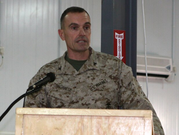 Col. Vincent A. Coglianese, the commanding officer of Combat Logistics Regiment 27 (Forward), addresses the Marines of CLR-27 (Fwd) and Combat Logistics Battalion 46 during a Transfer of Authority ceremony aboard Al Asad Air Base, Iraq, Dec. 16, 2009.  Lt. Col. Eric Davis, the commanding officer of CLB-46, took over as the logistics combat element for Col. Vincent A. Coglianese, the commanding officer of CLR-27 (Fwd).  (U.S. Marine Corps photograph by Lance Cpl. Melissa A. Latty)