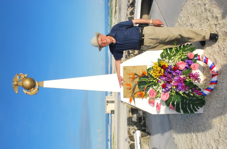 Standing in front of the Marine Corps monument on Wake Island is Mr. John Dale, a former defender during the battle for Wake Island Dec. 8 – 23, 1941. Mr. Dale, then U.S. Marine Corporal Dale was captured during the surrender of Wake on Dec. 23, 1941. After being held for 44 months Dale was liberated by U.S. Army forces in Hokkaido Japan. Mr. Dale returned to Wake with Military Historical tours on Dec 12. (U.S. Air Force photo/Tech. Sgt. Tom Czerwinski)