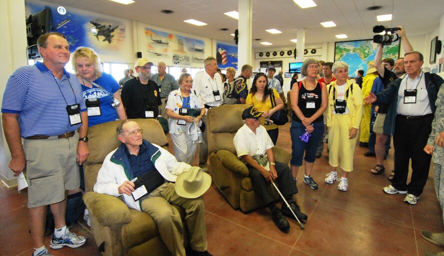Sitting in lounge chairs and answering questions from reporters and tourists at Wake Island’s passenger terminal, is Mr. John Dale, 89, and Mr. Francisco Carbullido, 89. Both men were captured during the battle of Wake Island on Dec. 23, 1941 and held captive for 44 months. (U.S. Air Force photo/Tech. Sgt. Tom Czerwinski)