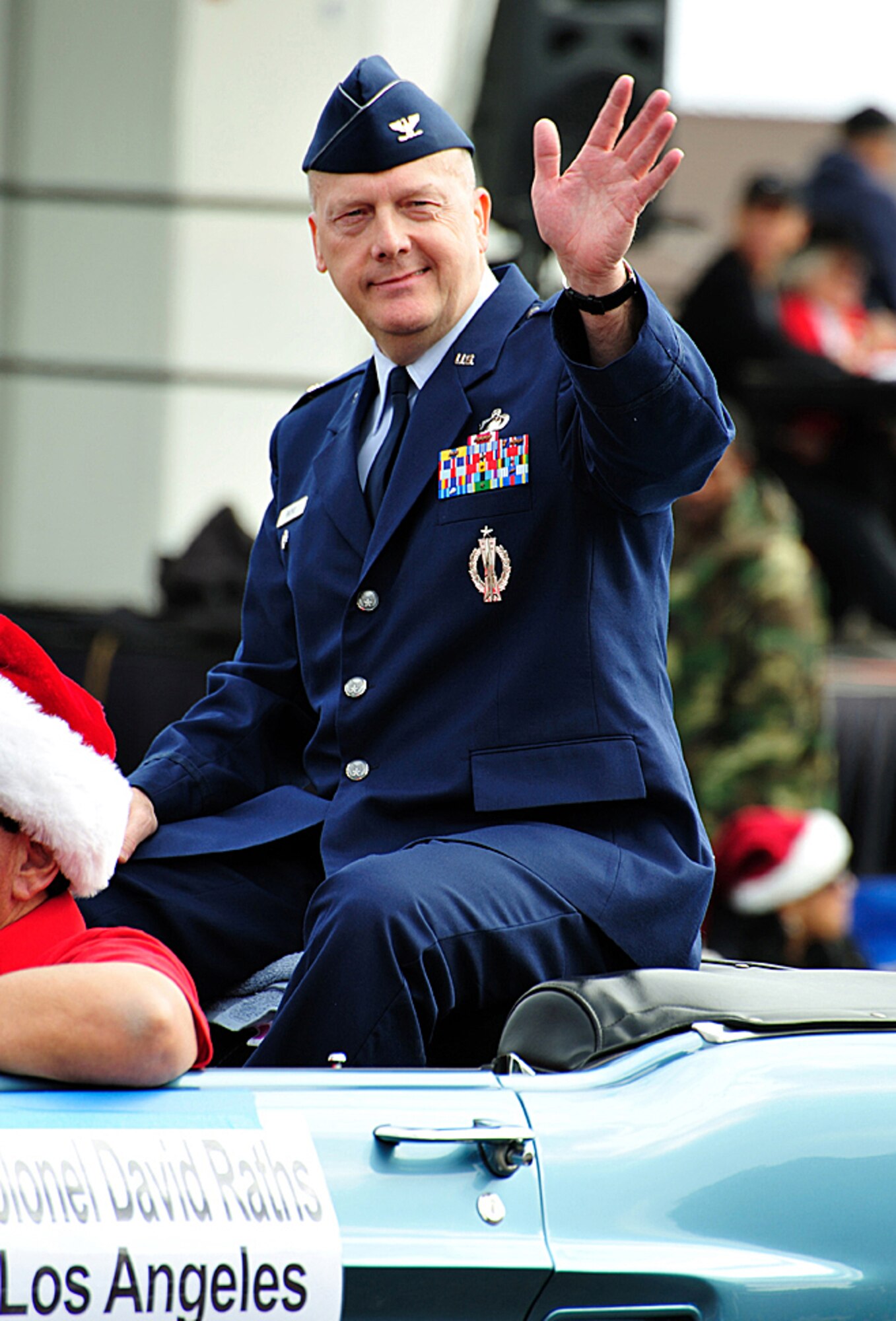 Col. David Raths, 61st Air Base Wing vice commander, represents Los Angeles Air Force Base during the 29th Annual Holiday Spirit of San Pedro Parade, Dec. 6. Also participating from the base are the Los Angeles AFB Honor Guard and Fort MacArthur cheerleading squad.  (Photo by Emilio Sanchez)