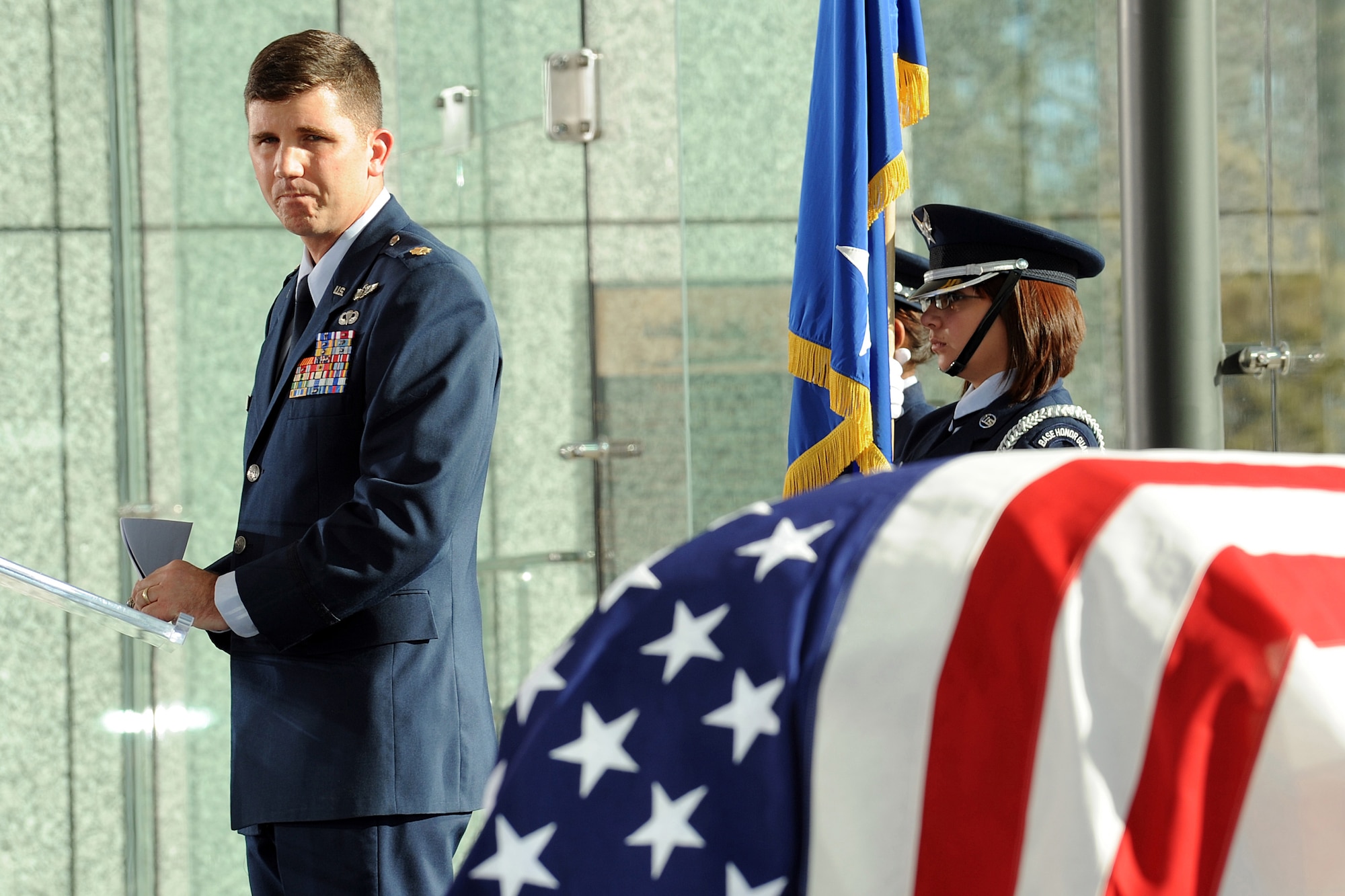 Maj. Paul Carlton speaks at the funeral of his grandfather, retired Gen. Paul Carlton, at the Air Force Academy Cemetery Dec. 14, 2009. General Carlton was commander of Military Airlift Command at Scott Air Force Base, Ill., and received Silver Star, Distinguished Flying Cross and Purple Heart medals before he retired March 31, 1977. He died Nov. 23 from natural causes. Major Carlton is a student at Air University's School of Advanced Air and Space Studies at Maxwell Air Force Base, Ala. (U.S. Air Force photo/Mike Kaplan)