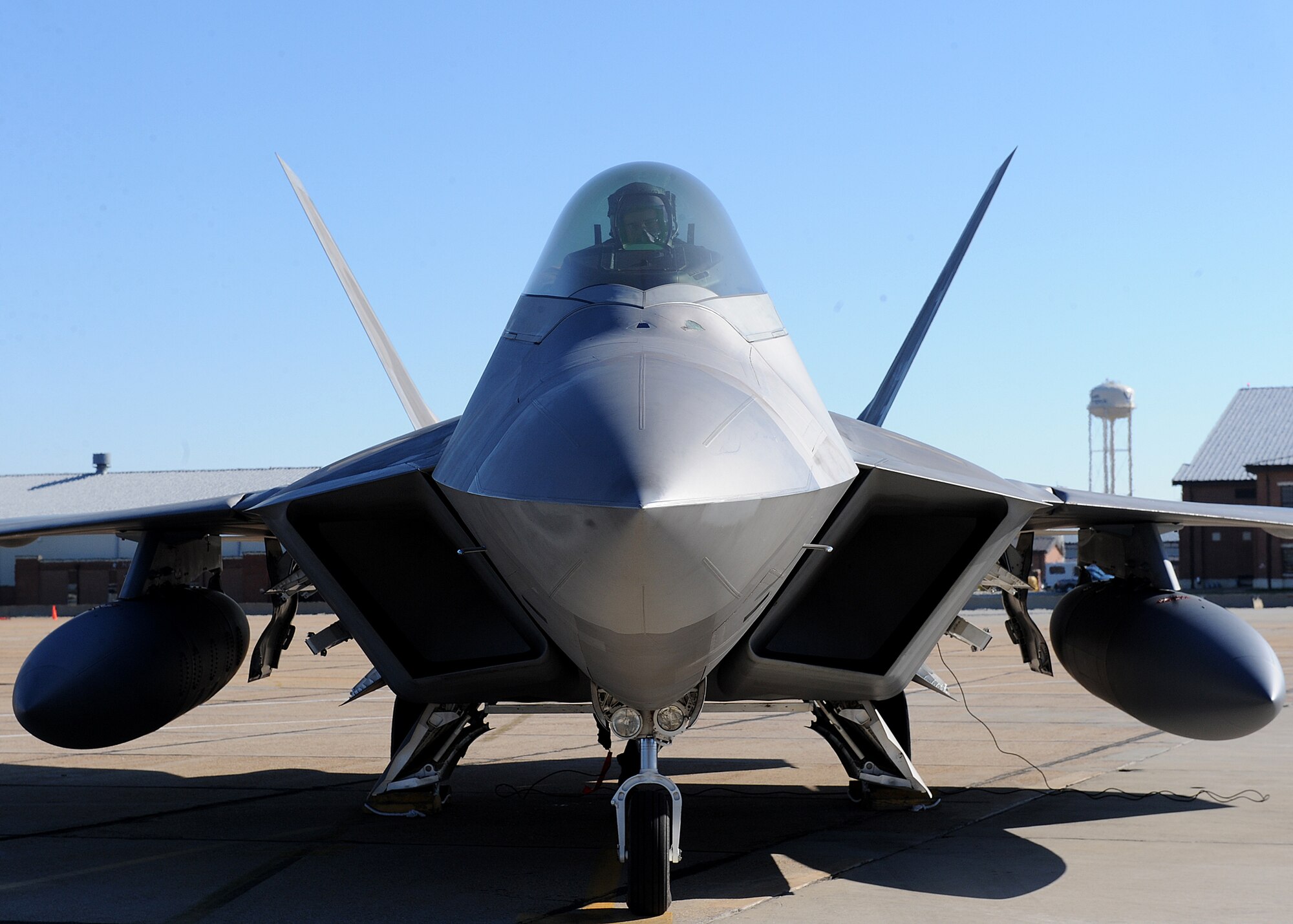 LANGLEY AIR FORCE BASE, Va. -- Lt. Col. David Abba waits for the signal to exit his aircraft after returning from a deployment Dec. 16. The 27th FS deployed six F-22 Raptors in support of a 40-day training exercise in southwest Asia. (U.S. Air Force photo/Airman Rebecca Montez) 