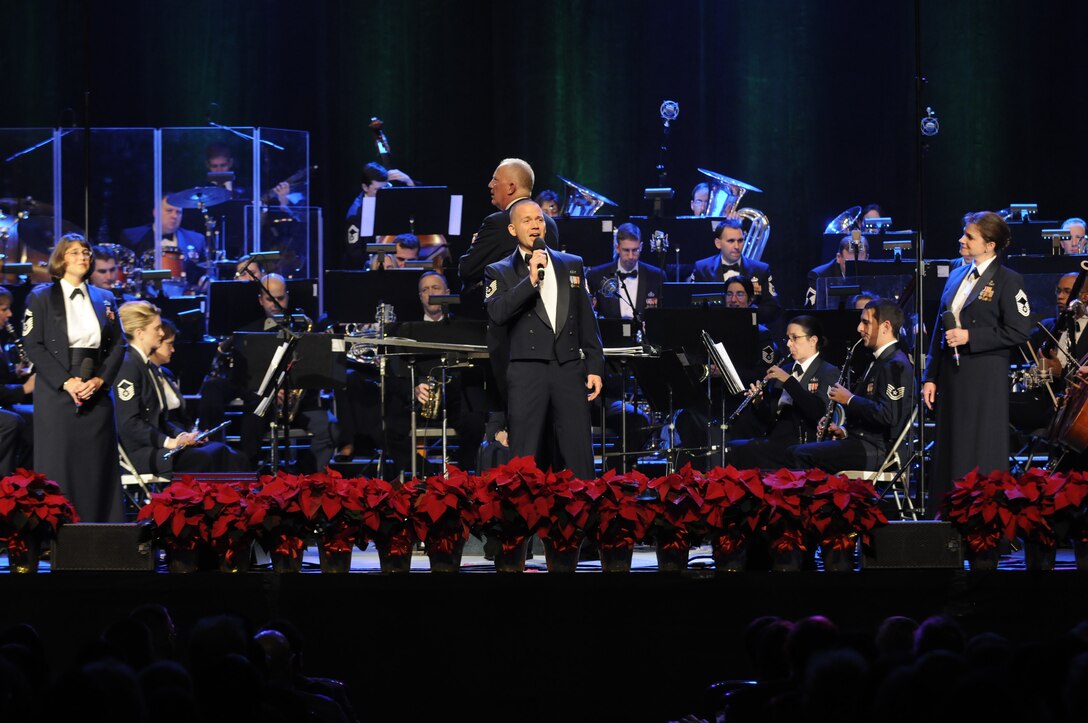 Senior Master Sgt. Robin McConnell, Technical Sgt. Taylor Armstrong, and Chief Master Sgt. Carol Wiley close the first portion of the program with “It’s in Every One of Us”.  This year’s holiday program, “Hooray for Holidays”, took place at Daughter’s of the American Revolution Constitution Hall in Washington, D.C., and featured holiday music from stage, television, and movies.  (Photo by SrA Tim Chacon)