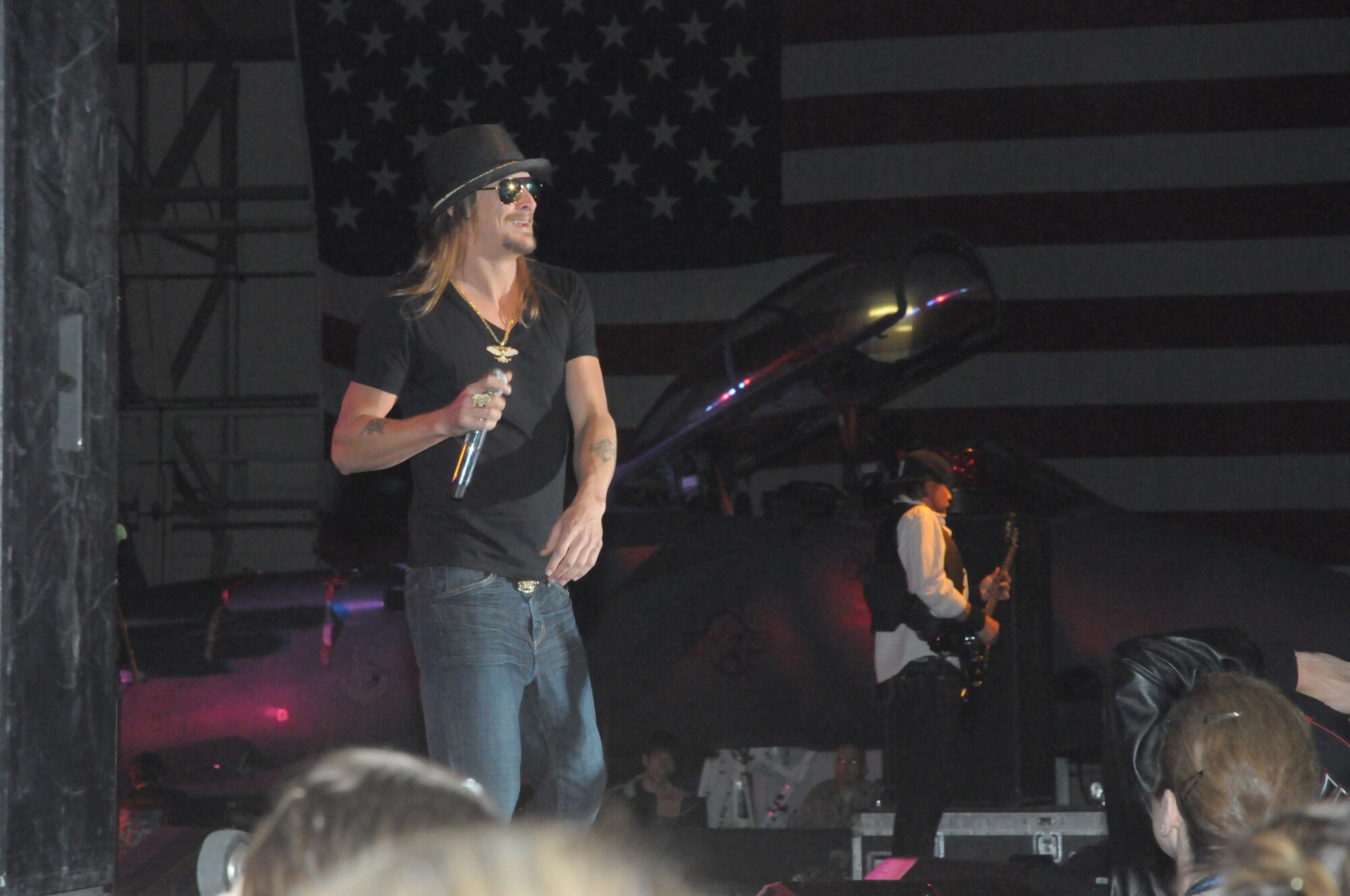 Kid Rock and the Twisted Brown Trucker Band performed live during the Tour for the Troops 2009 concert in Hangar 7 at RAF Lakenheath, England, Dec. 11.  Kid Rock was joined by comedian Carlos Mencia and singer Jessie James as they toured bases in Europe and Southwest Asia to show their appreciation and support for the military.  (U.S. Air Force photo by Staff Sgt. Connor Estes)