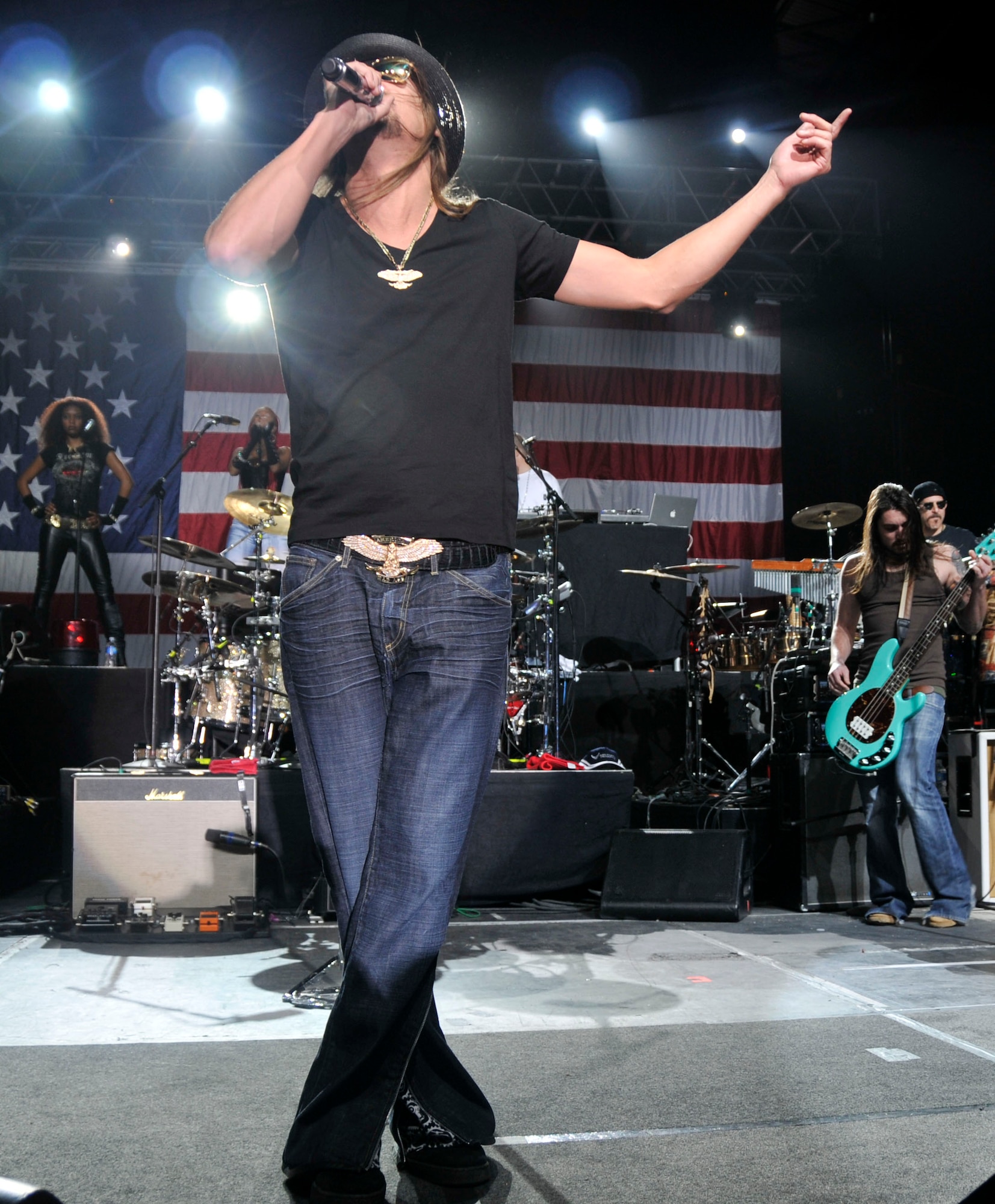 Music artist Kid Rock performs during the Tour for the Troops 2009 concert in Hangar 7 at RAF Lakenheath, England, Dec. 11.  Kid Rock was joined by comedian Carlos Mencia and singer Jessie James as they toured bases in Europe and Southwest Asia to show their appreciation and support for the military.  (U.S. Air Force photo by Tech. Sgt. Chris Stagner)