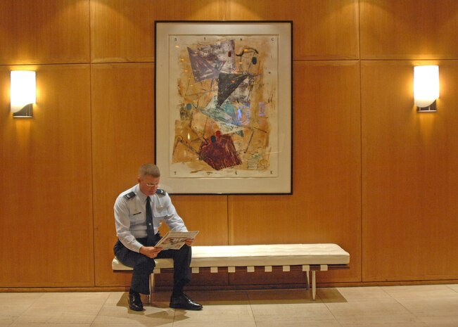 LOS ANGELES -- Col. Dave Belote, 99th Air Base Wing commander, reads the newspaper by himself while waiting in the lobby of the hotel for the bus that will take him to his first appearance on “Jeopardy!” Colonel Belote currently sits as the 12th highest in total earnings of all-time in the show's history (U.S. Air Force photo/Chief Master Sgt. John Zincone)