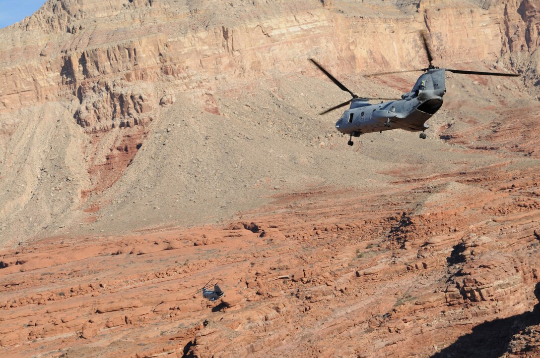 Two CH-46 Sea Knights from Marine Medium Helicopter Squadron 764 fly through the Grand Canyon en route to the remote village of the Havasupai tribe in order to deliver Christmas gifts to children as part of the Toys for Tots program Dec. 16, 2009. For 14 years, the reserve squadron, based at Edwards Air Force Base north of Los Angeles, has flown donated toys to the village of Supai, Ariz., nestled in a tributary canyon off the Grand Canyon's southern edge.
