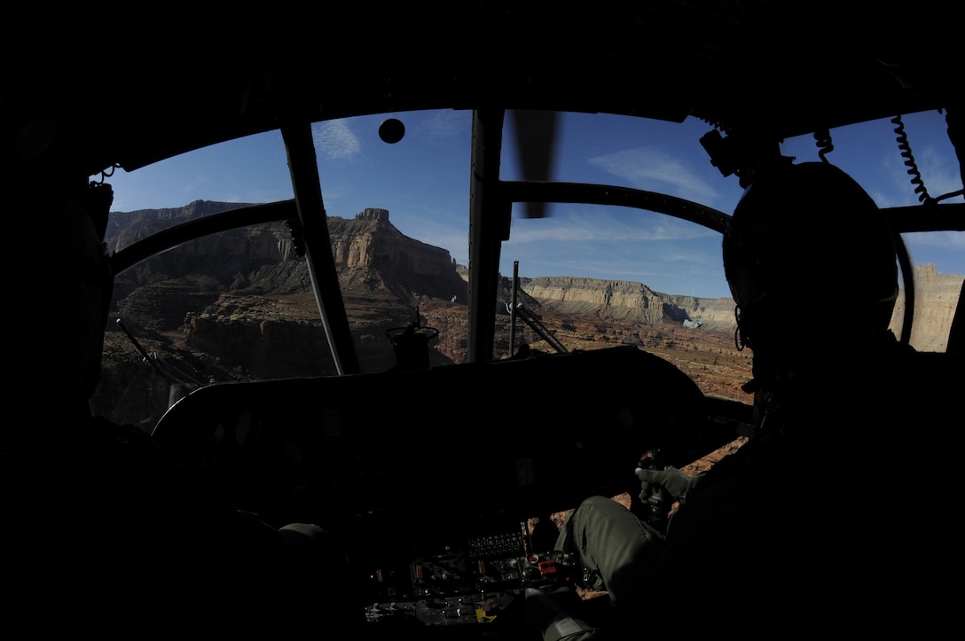 Pilots from Marine Medium Helicopter Squadron 764 fly CH-46 Sea Knights through the Grand Canyon en route to the remote village of the Havasupai tribe in order to deliver Christmas gifts to children as part of the Toys for Tots program Dec. 16, 2009. For 14 years, the reserve squadron, based at Edwards Air Force Base north of Los Angeles, has flown donated toys to the village of Supai, Ariz., nestled in a tributary canyon off the Grand Canyon's southern edge.