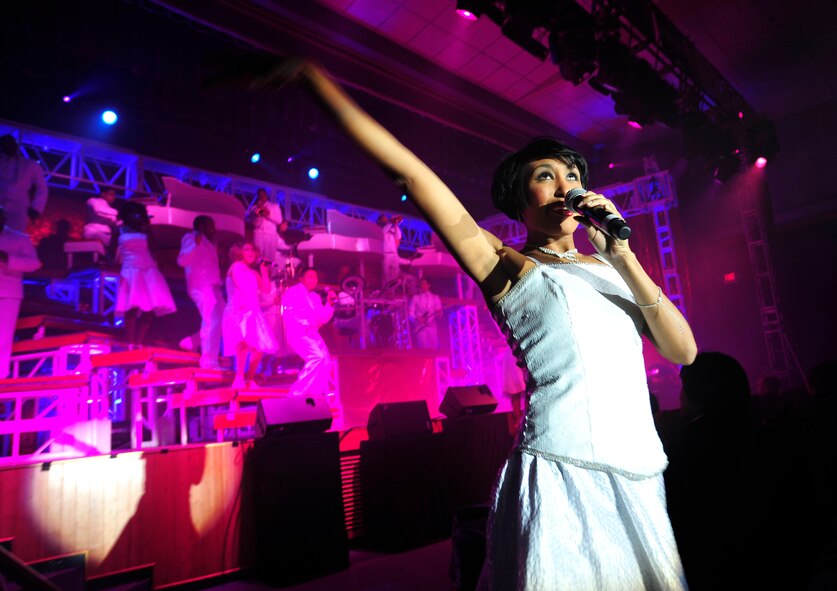 Tops in Blue Vocalist Staff Sgt. Aisha Smith performs for a standing roomonly audience at Osan Air Base, Republic of Korea, Dec. 17. (U.S. Air Forcephoto/Staff Sgt. Brian Ferguson)