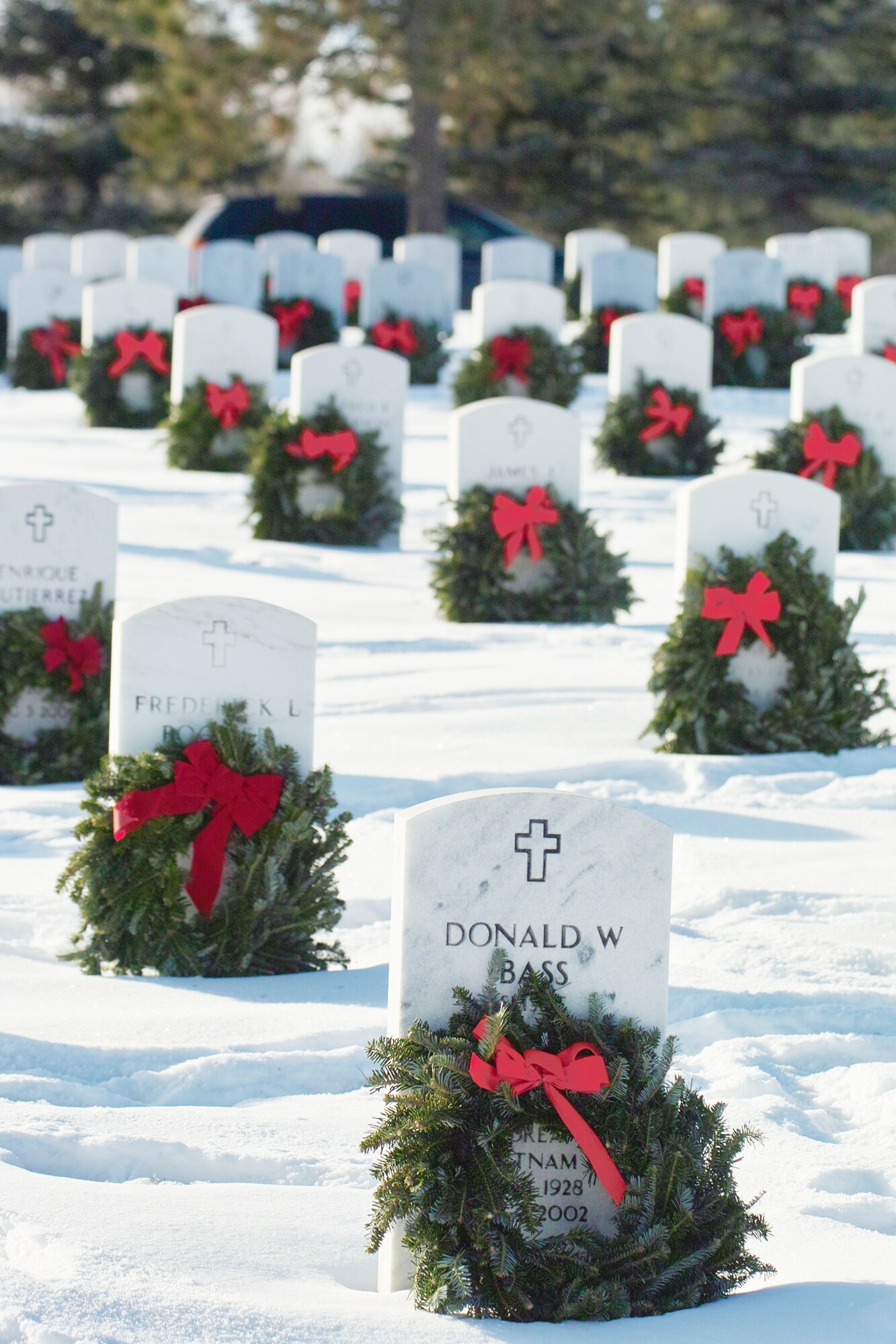 Wreaths adorn the graves of veterans during Wreaths Across America at Fort Logan National Cemetery in Littleton, Colo. Dec. 14, 2009. Eighty-seven volunteers from Buckley Air Force Base joined Civil Air Patrol members and volunteers from Schriever and Peterson air force bases and the Denver Metropolitan Area for a day of remembrance. (U.S. Air Force photo/Master Sgt. Steven Clark)