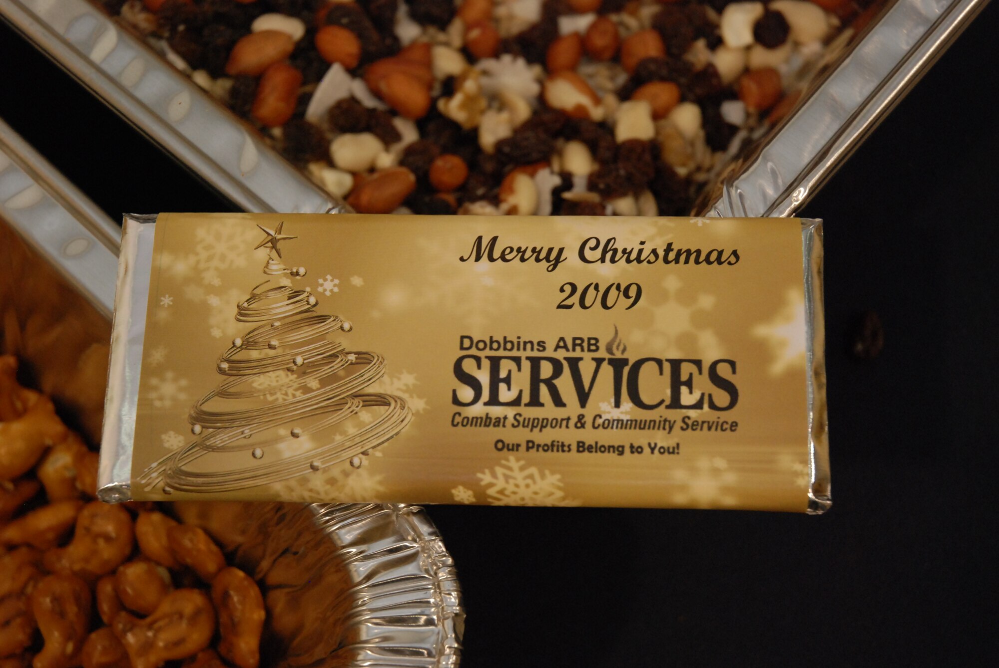 Always a vital part of the total Dobbins ARB team, this holiday season Dobbins Services is giving away more than 250 specially wrapped chocolate bars to service members returning from and preparing for deployment. (U.S. Air Force photo/Master Sgt. Stan Coleman)