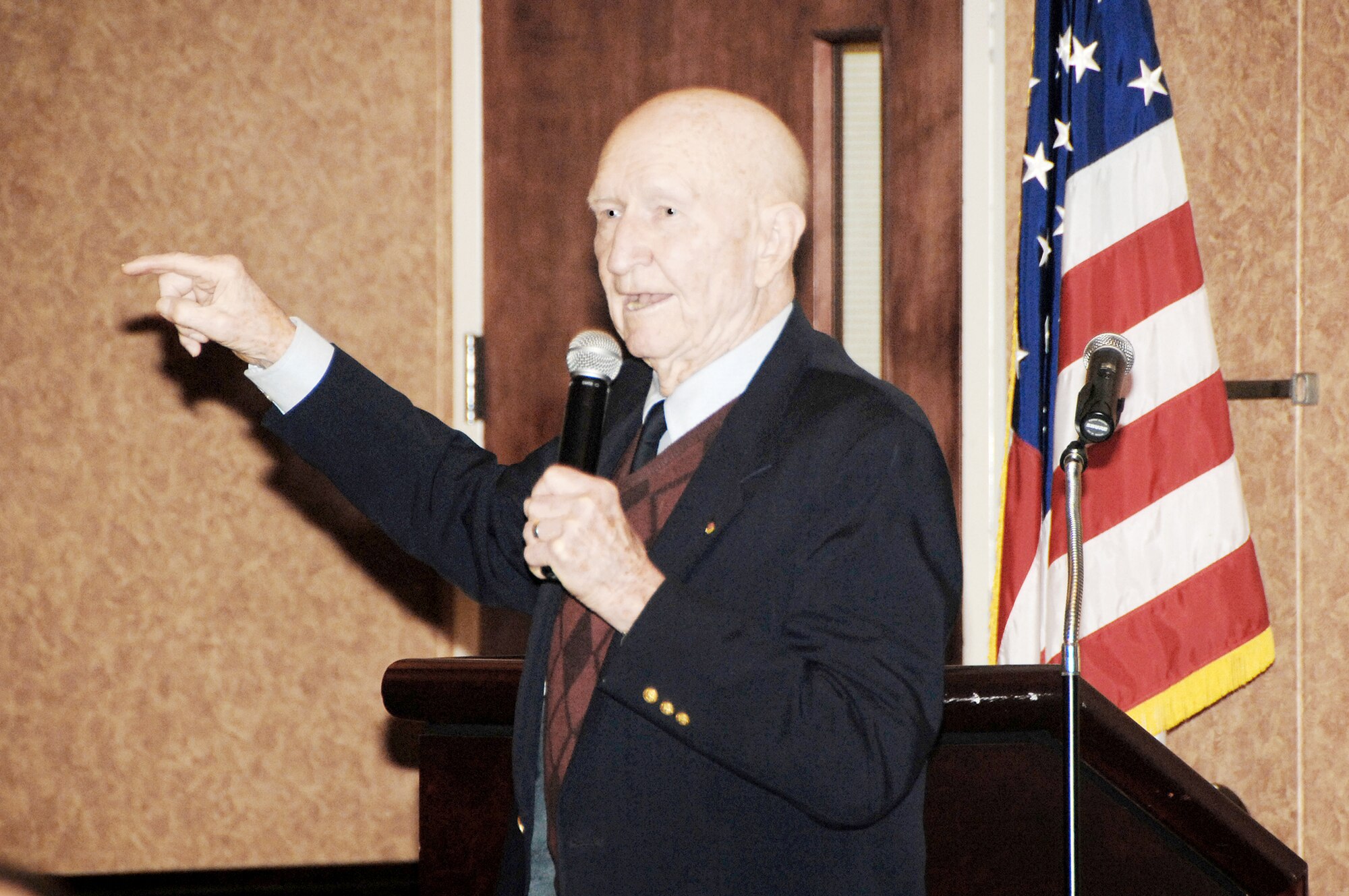 Retired Col. Gail Halvorsen speaks to a group of Airmen during the Airlift Tanker Association luncheon at Travis Air Force Base, Calif., Dec. 10, 2009. Colonel Halverson is known as the "Candy Bomber" for dropping candy from his aircraft to German children during the 1948 Berlin Airlift. (U.S. Air Force photo/Amanda Lopez)