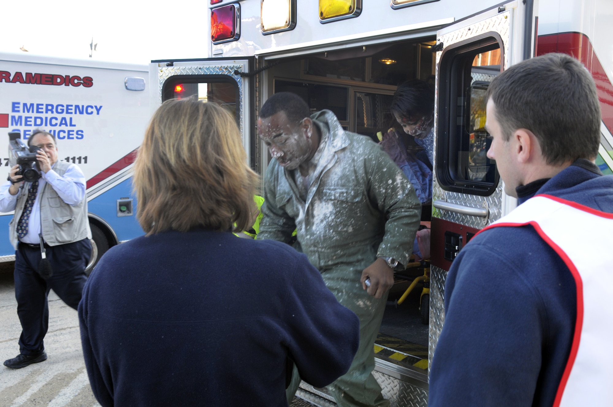 MSgt. William Pounds exits an ambulance at the Medical Center of Central Georgia to a triage area for the simulated victims. U. S. Air Force photo by Sue Sapp