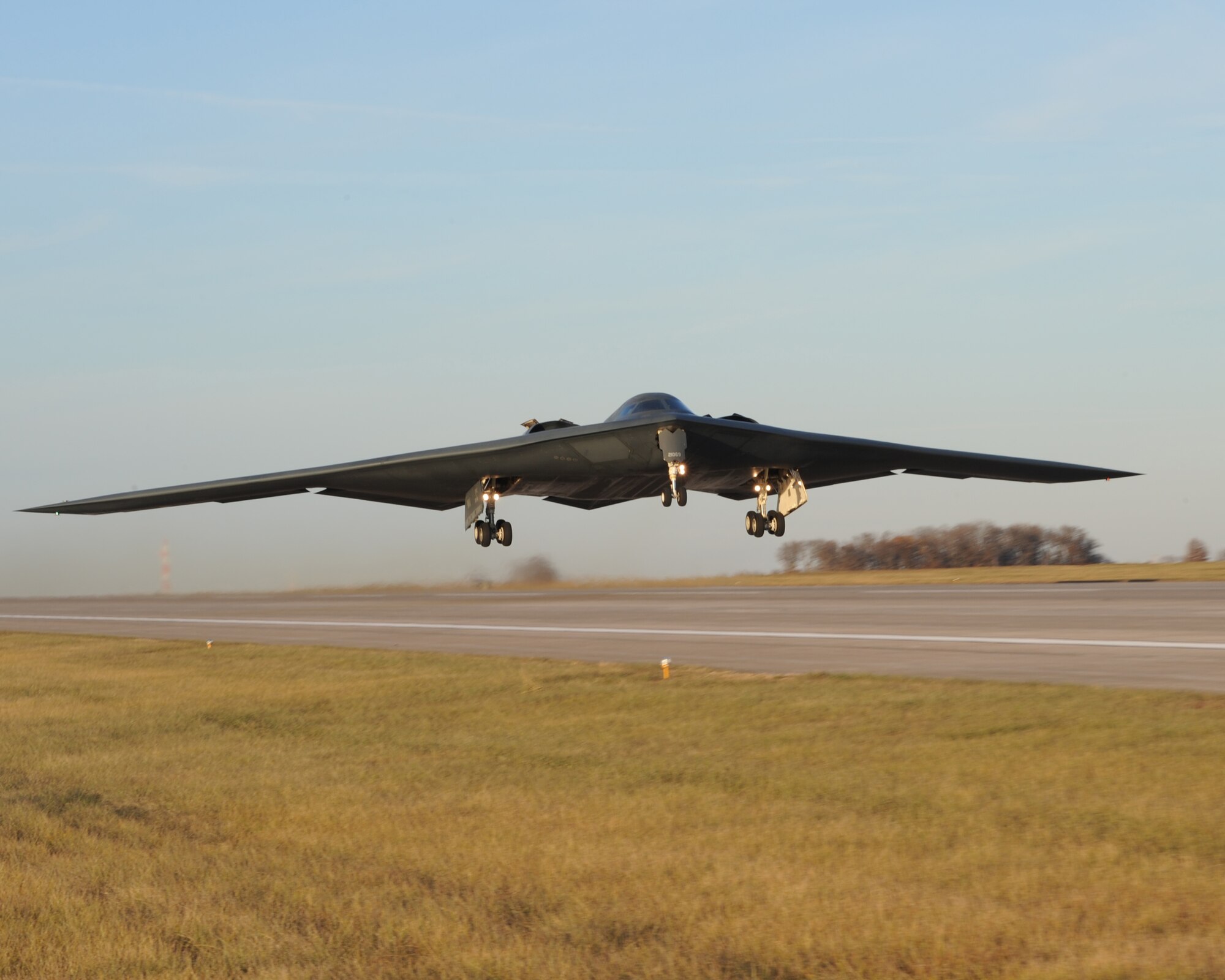 A B-2 Spirit begins to gain altitude during takeoff. The B-2's primary mission is to attack time-critical targets early in a conflict to minimize an enemy's war-making potential. 
