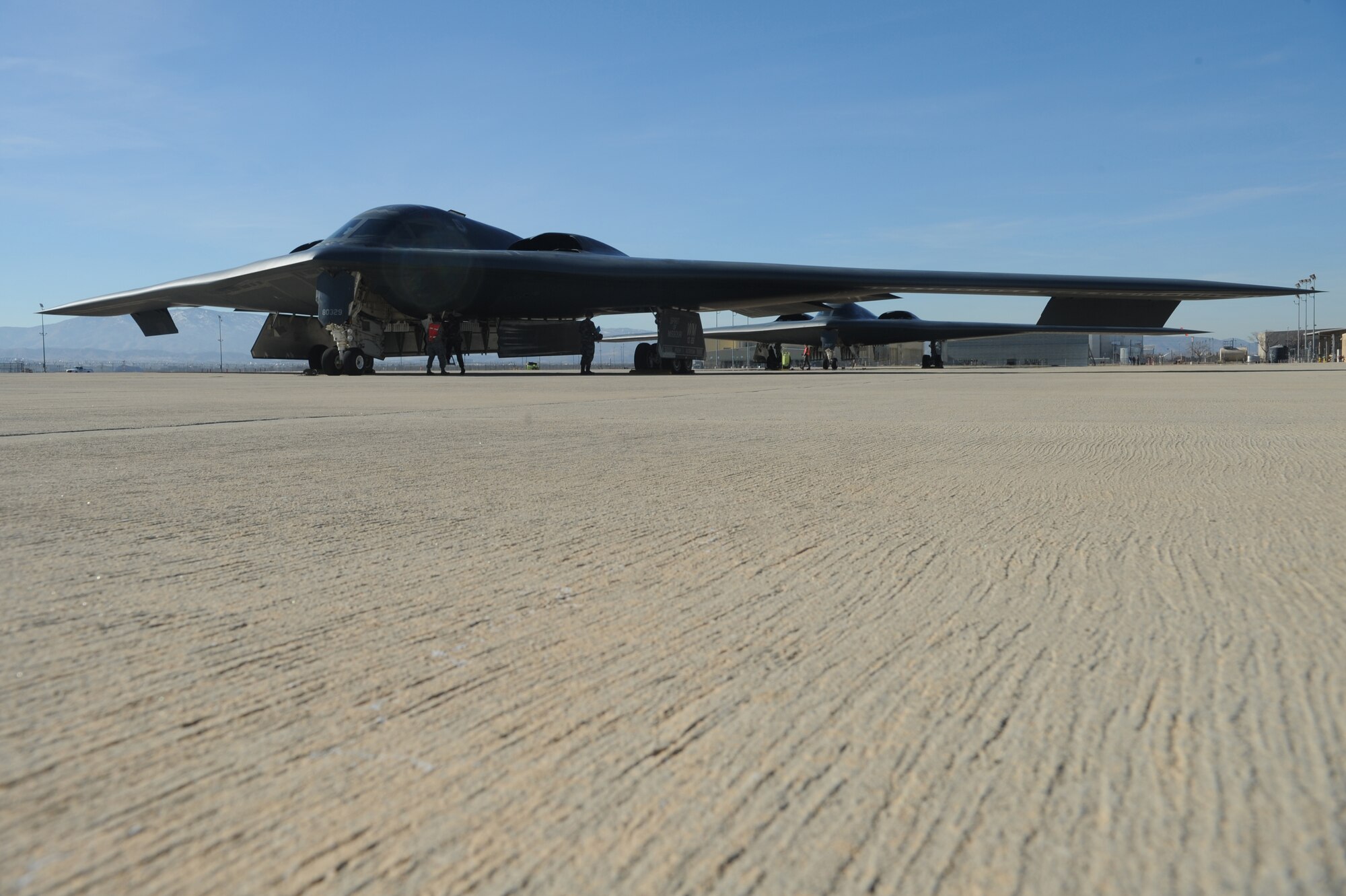 A B-2 bomber sits at Northrop Grumman's Plant 42, Production Flight Test Installation in Palmdale, Calif., Dec. 31, 2008. The B-2s arrived in preparation to flyover the Rose Bowl parade and game Jan. 1, 2009. (U.S. Air Force photo/Senior Airman Jessica Snow)