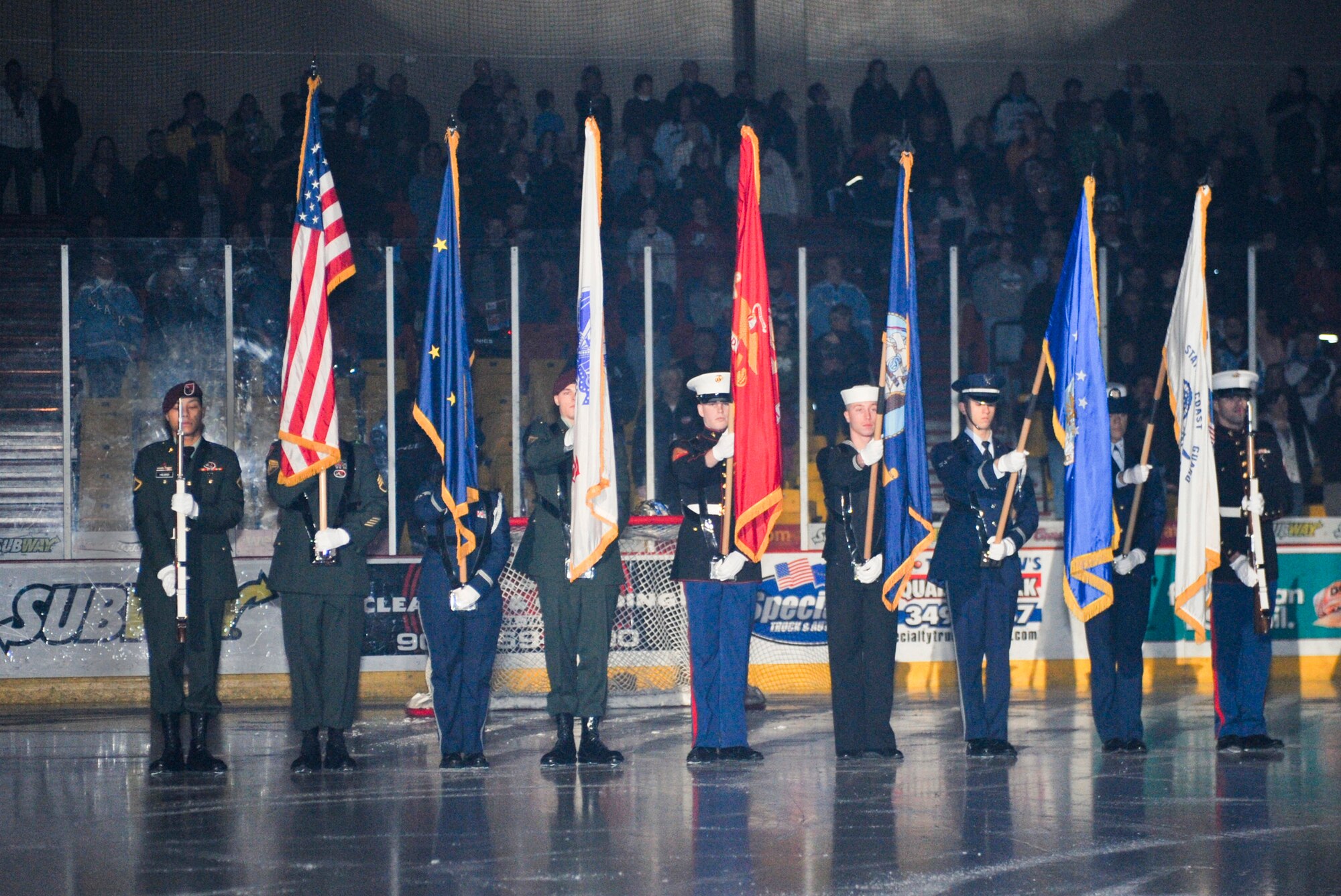 ANCHORAGE, Alaska – A military honor guard presents the colors during the national anthem at an Alaska Aces game Dec. 12. The Alaska Aces organization held a three-game military appreciation series Dec. 11-13. (U.S. Air Force photo/Airman 1st Class Christopher Gross)