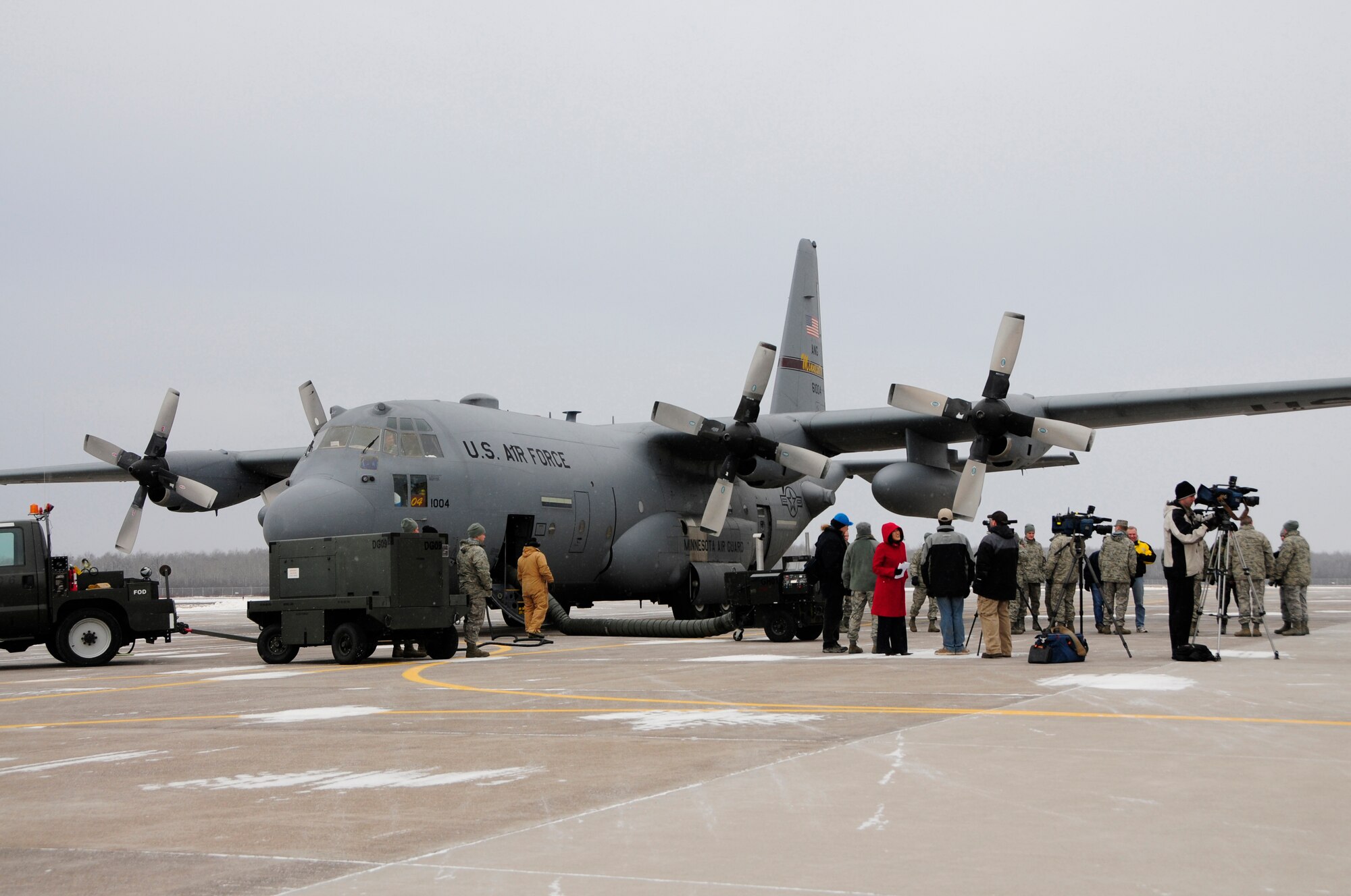 Members of the 148th Fighter Wing Air National Guard load a C-130 Hercules as part of the first wave of Civil Engineers from the wing to depart Duluth, Minn. Dec. 17th, 2009.  A large number of 148th Civil Engineers will deploy to Bagram Airfield, Afghanistan for approximately six months in late 2009 and early 2010.