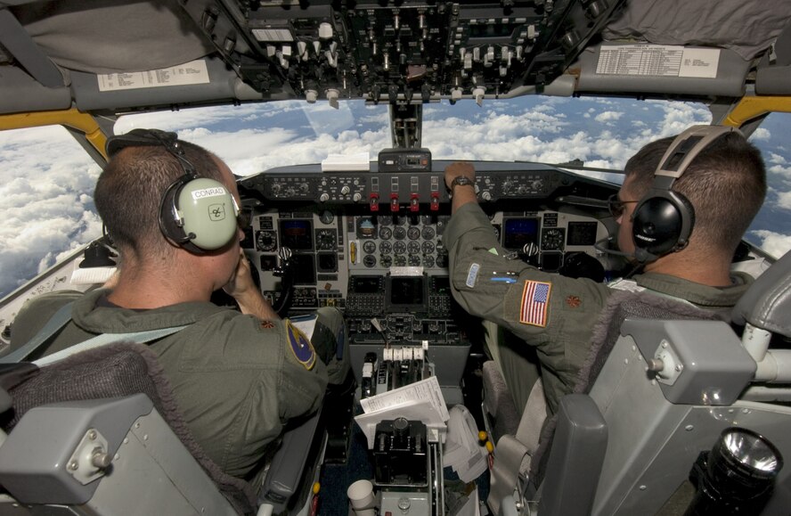 Major Noah Conrad, left, and Maj. Jeffrey Cole, assigned to the 133rd Air Refueling Squadron, New Hampshire Air National Guard, fly a KC-135 Stratotanker during Cope Thunder 06-03 over an unknown location July 26, 2006. Cope Thunder, held at Eielson Air Force Base, Alaska, is the Pacific Air Forces' largest joint combined air combat training exercise. (U.S. Air Force photo/Senior Master Sgt. Jeff Rohloff)