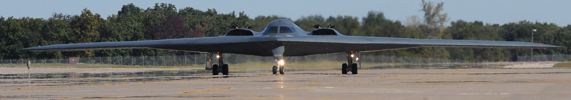 A B-2 Spirit races down the Whiteman taxiway in preparation for takeoff. The B-2's primary mission is to attack time-critical targets early in a conflict to minimize an enemy's war-making potential.  (U.S. Air Force Photo/ Airman 1st Class Carlin Leslie)