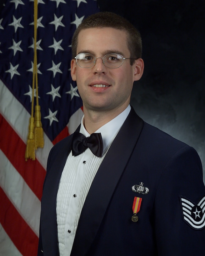 This month, Technical Sgt. Tadd Russo chronicles a day in the life of The USAF Band's Music Production Staff.  Sergeant Russo is a 1999 graduate of The Ohio State University, where he earned both a Bachelor of Music and a Bachelor of Music in Education, and was the recipient of The OSU College of the Arts Grant for work in Theater Music. He earned his Master of Music Degree in 2001, also from Ohio State. While at OSU, he was the composer-in-residence for The Ohio State University Symphony Orchestra, and studied with Thomas Wells, Donald Harris and Jan Radzynski. Sergeant Russo is a member of the Society of Composers, Inc. and ASCAP.  (AF Photo)