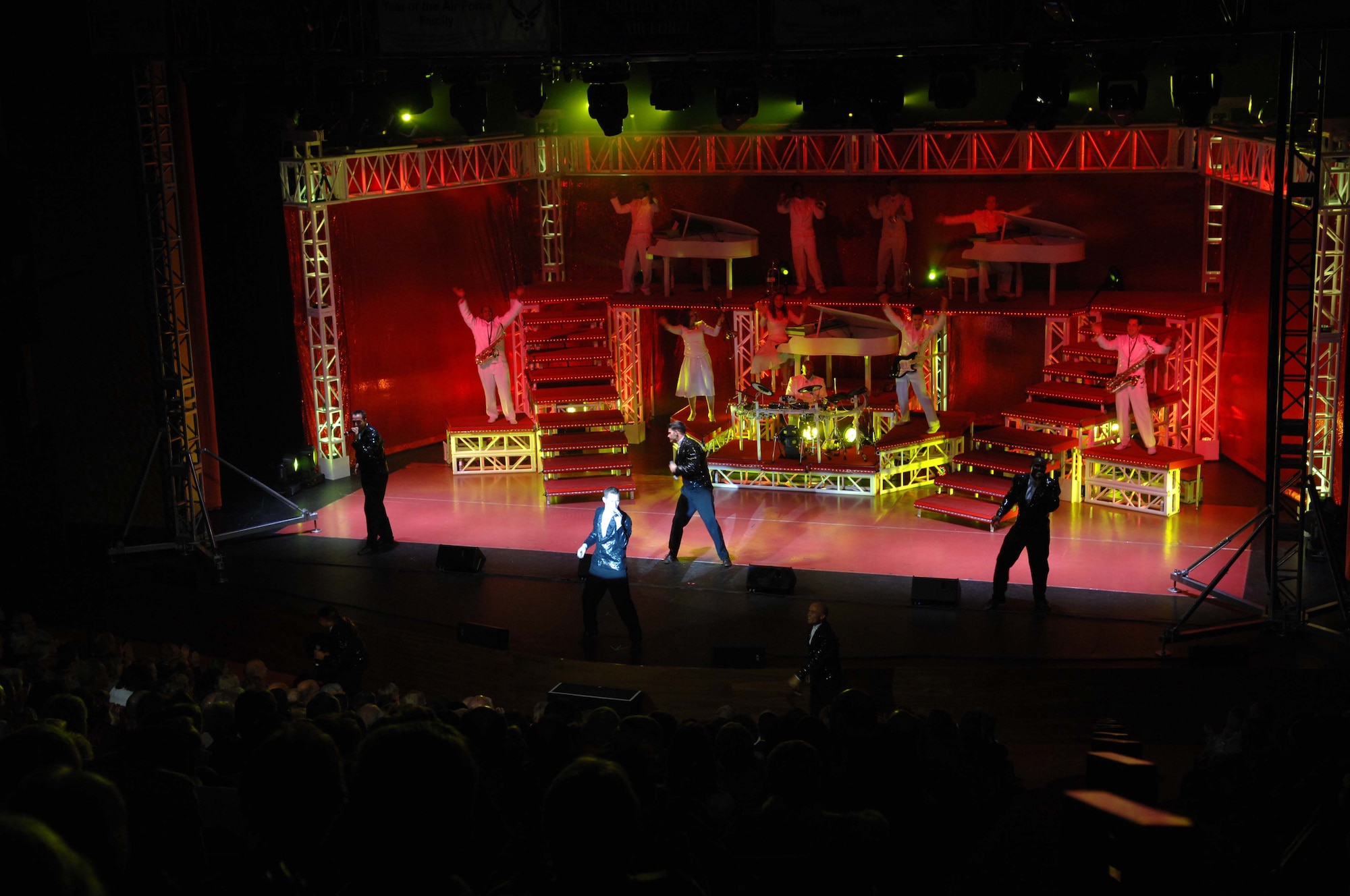 The Air Force performing troupe ?Tops in Blue? entertained a theater full of military and civilian fans on their stop in Minnesota, on Dec. 5, 2009. Hosted at the Burnsville Performing Arts Center, leadership from the 934th Airlift Wing, U.S. Air Force Reserve, and the 133rd Airlift Wing, Minnesota Air National Guard, worked with the group to stage the rare appearance. Tops in Blue presents shows around the world for the Air Force with a legacy of over fifty years of entertaining the troops. The Minnesota audience said they were thrilled with the event. U.S. Air Force photo by Senior Master Sgt. Mark Moss.