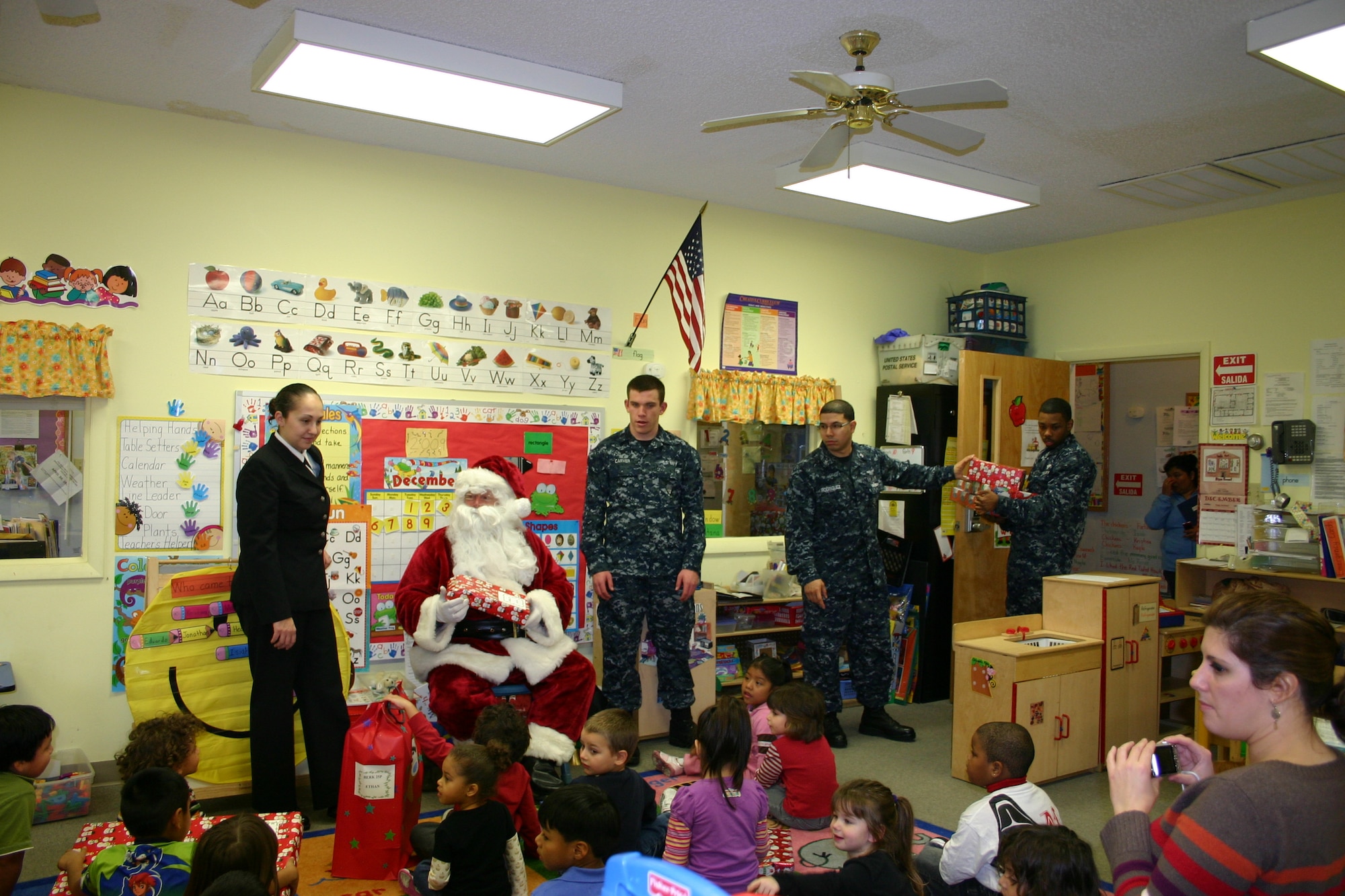 The Lakehurst community on Joint Base McGuire-Dix-Lakehurst provided more than 250 children in the Ocean County Head Start school programs with toys from Santa, as part of the annual Giving Tree program. 

This is the 35th year that Santa loaded his sleigh and delivered toys to the children of the Toms River, Manchester and Berkeley Head Start schools. This year he was  accompanied by a dozen Navy Sailors. (courtesy photo)