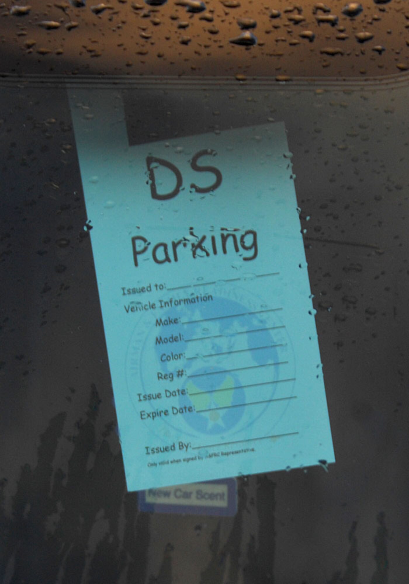 A deployed spouses parking decal properly displayed in a vehicle. The parking spots are located at the BX, hospital and commissary.  The decals are available to all spouses who attend the briefing. (U.S. Air Force photo by Tech. Sgt. Christopher Campbell)