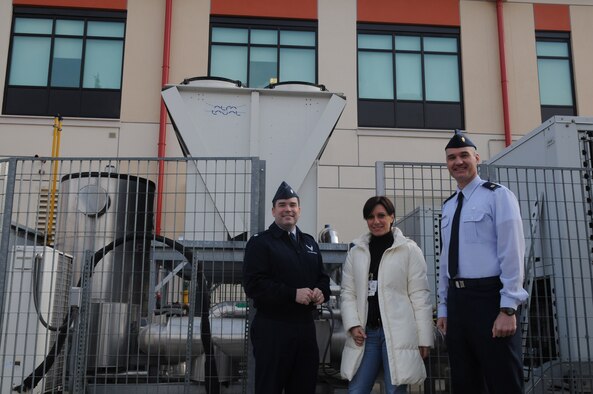 Lt. Col. John Savage, 31st Medical Support Squadron commander, Manuela Solda, 31st Medical facility manager and Maj. James Robertson, 31st MDSS medical logistics flight commander, stand in front of the equipment that earned them the ENERGY STAR recognition.  Aviano hospital recently received the Environmental Protection Agency's ENERGY STAR rating. The rating is a national symbol for superior energy and environmental protection.  (U.S. Air Force photo/Staff Sgt. Mercedes Crossland) 