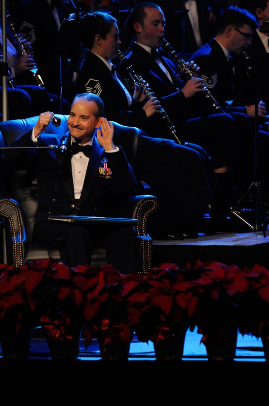 The Concert Band, with help from Master Sgt. Phil Krzywicki, tells the story of “The Polar Express”.  This year’s holiday program, “Hooray for Holidays”, took place at Daughter’s of the American Revolution Constitution Hall in Washington, D.C., and featured holiday music from stage, television, and movies.  (Photo by SrA Tim Chacon)