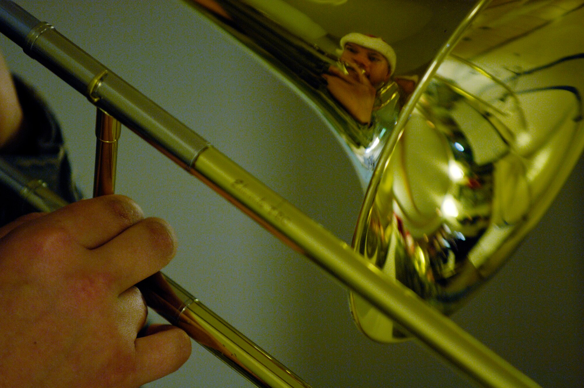 VANDENBERG AIR FORCE BASE, Calif. – Airman 1st Class Ryan Terronez, a member of the Band of the Golden West from Travis AFB, Calif., plays Christmas carols at the 30th Space Wing headquarters Thursday, Dec. 17, 2009, here. The band toured main base and played Christmas songs to members of Vandenberg. (U.S. Air Force photo/Staff Sgt. Levi Riendeau)