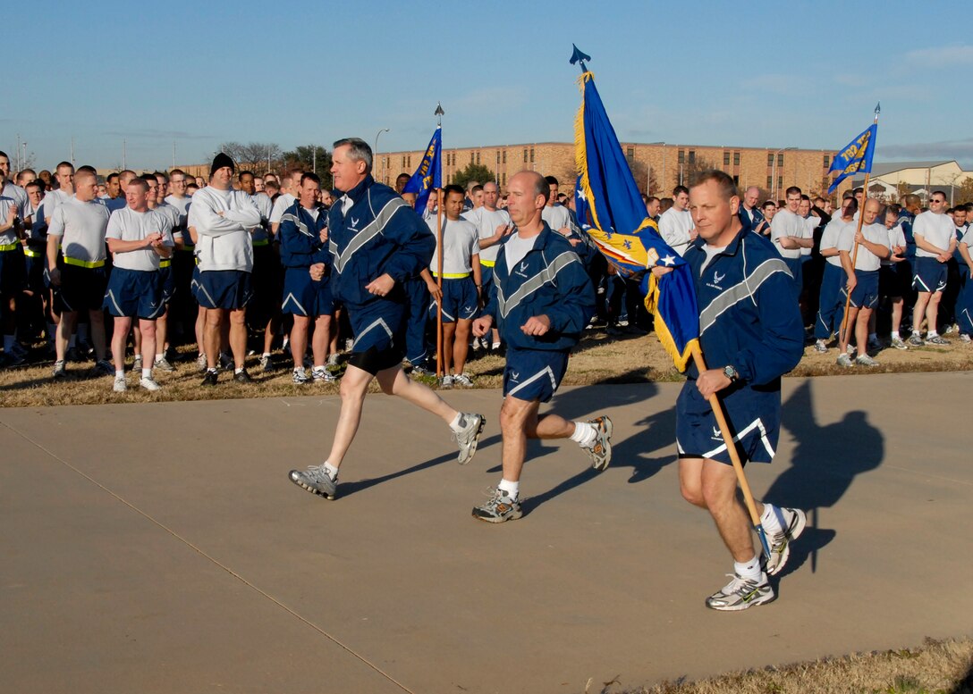 Wing leadership (from left to right), Brig. Gen. O.G. Mannon, 82nd Training Wing commander; Col. Michael Hake, 82nd TRW vice commander; and Chief Master Sgt. Kenneth Sallinger, 82nd TRW command chief, led the Wing Run Dec. 17. The entire 82nd Training Wing ended this year’s Wingman Day by participating in a 3-mile run around the base. (U.S. Air Force photo/Mike Litteken)