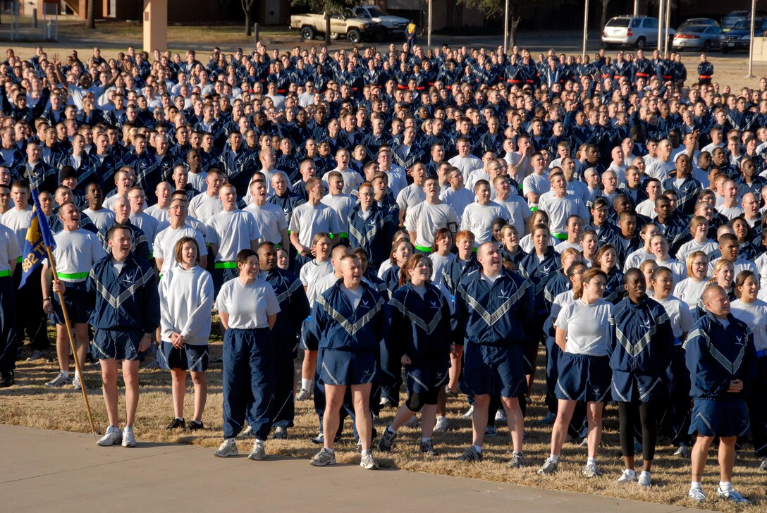 Airmen stand in formation at the parade field before the Wing Run Dec. 17. The entire 82nd Training Wing ended this year’s Wingman Day by participating in a 3-mile run around the base. (U.S. Air Force photo/Mike Litteken)
