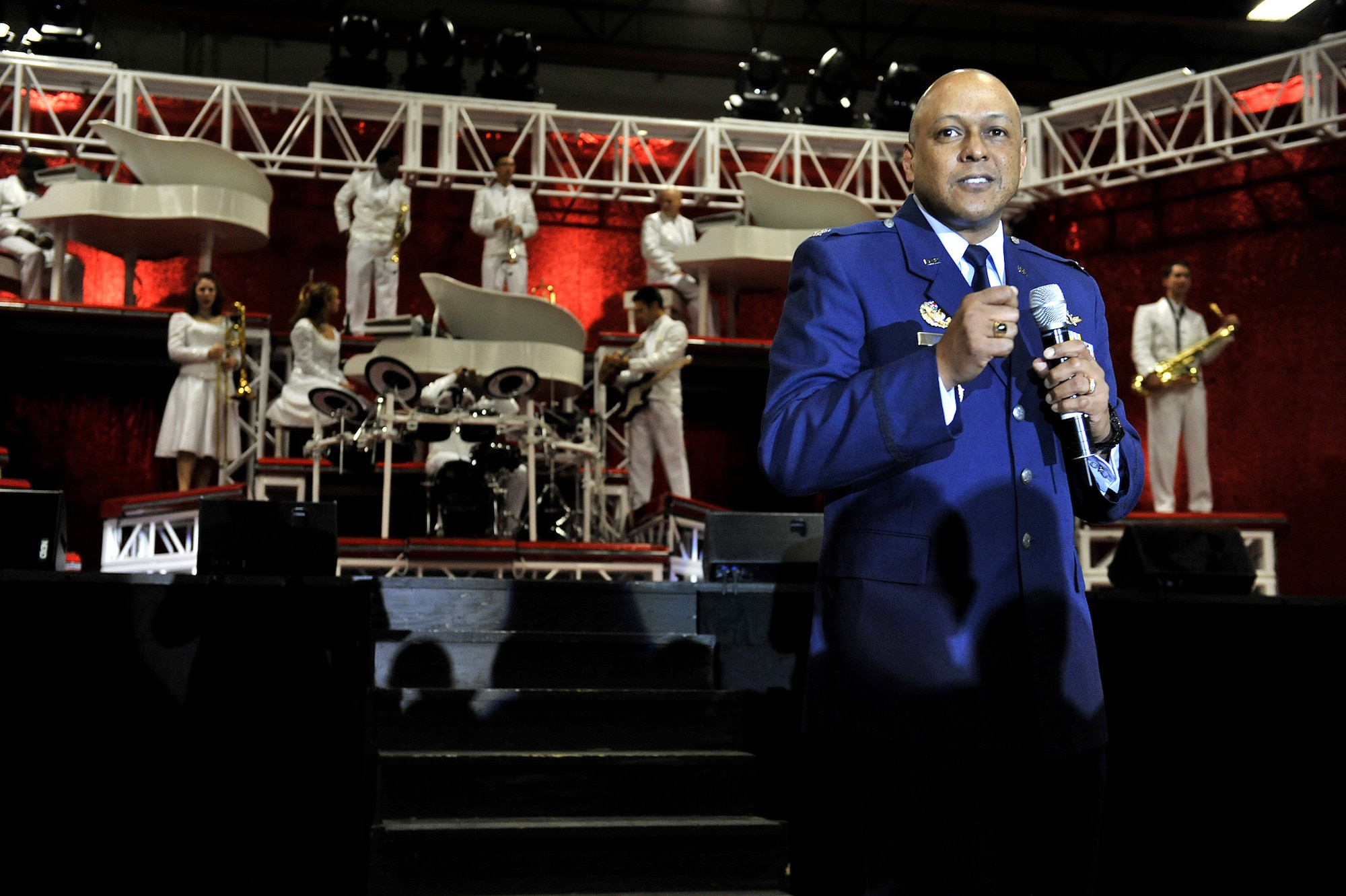 Col. Anthony Cotton, 341st Missile Wing vice commander, welcomes the audience at the start of the Tops In Blue performance Dec. 10 at the Four Seasons Arena in Great Falls, Mont. (U.S. Air Force photo/John Turner)