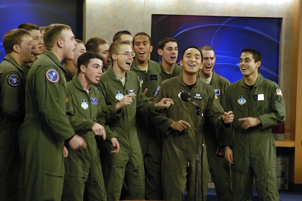Air Force Academy Cadets with the a cappella group In the Stairwell perform for KKTV Channel 11 in Colorado Springs, Colo., Dec. 11, 2009. The group of about 20 cadets has also recently performed in a statewide competition against groups from the University of Colorado, Denver University and Colorado State University. (U.S. Air Force photo/John Van Winkle)