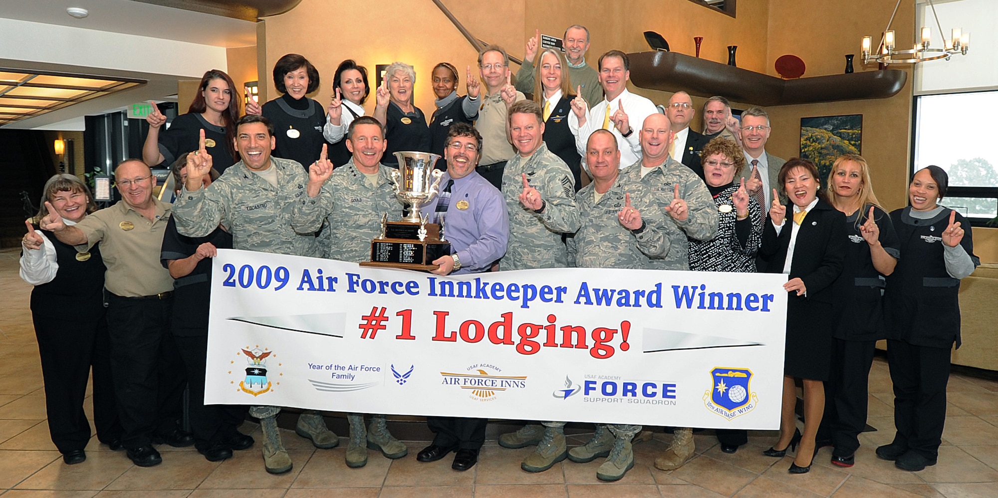 Academy leaders and Rampart Lodge staff pose for a photo in the Rampart Lodge lobby Dec. 3, 2009, after having been named the best lodging facility in the Air Force 2009 Innkeeper Awards. (U.S. Air Force photo/Rachel Boettcher)