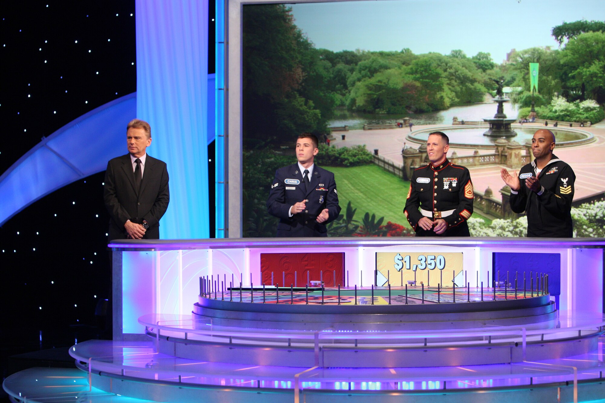Airman 1st Class Christopher Zayas, 43rd Civil Engineer Squadron, (right)
competes on the “Wheel of Fortune” game show during the show’s Hero’s
Week, airing today. For full results on how the Airman compete, watch tonight’s
episode at 7:30 p.m. on NBC. (Courtesy photo)