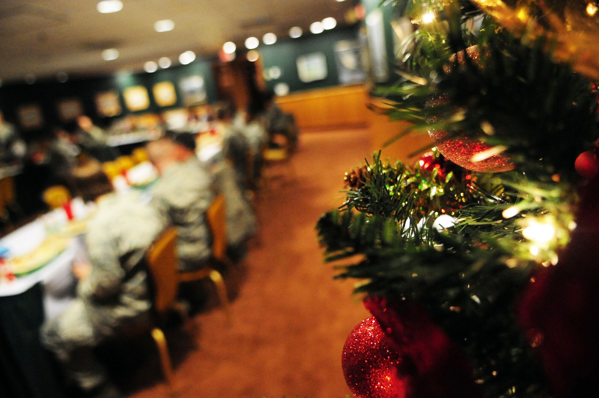 BARKSDALE AIR FORCE BASE, La. – Operation Bright Holidays sponsors and recipients have lunch at the Barksdale Club, Dec. 16. Twelve enlisted Airmen were nominated by their supervisors and chosen by the Company Grade Officer’s Council to receive a free trip to their home town to visit family for the holiday sponsored by the Military Affairs Council, The Anita Mary Tipping Steinau Foundation and the Credit Bureau of Louisiana. Many of the Airmen who were chosen for the program had not visited their families in years due to their dedication to the mission, and those who could not afford airfare. (U.S. Air Force photo by Senior Airman Joanna M. Kresge)