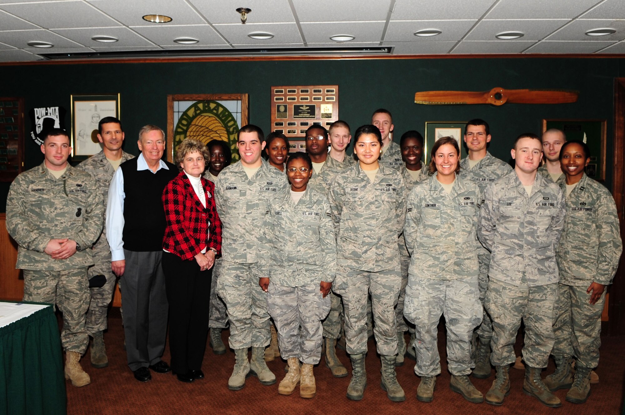 BARKSDALE AIR FORCE BASE, La. – Operation Bright Holidays sponsors and recipients pose for a group photo at the Barksdale Club, Dec. 16. Twelve enlisted Airmen were nominated by their supervisors and chosen by the Company Grade Officer’s Council to receive a free trip to their home town to visit family for the holiday sponsored by the Military Affairs Council, The Anita Mary Tipping Steinau Foundation and the Credit Bureau of Louisiana. Many of the Airmen who were chosen for the program had not visited their families in years due to their dedication to the mission, and those who could not afford airfare. (U.S. Air Force photo by Senior Airman Joanna M. Kresge)