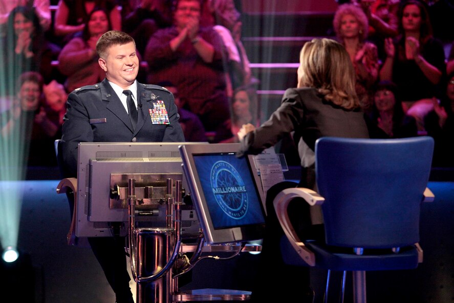 OFFUTT AIR FORCE BASE, Neb. - Lt. Col. Todd L. Phipps, chief of the 55th Wing command post, trys his best to win a million dollars on the popular game show "Who Wants to be a Millionaire," Dec. 9 - 10. Although he didn't win the million, the colonel walked away $25,000.00 richer. U.S. Air Force courtesy photo 