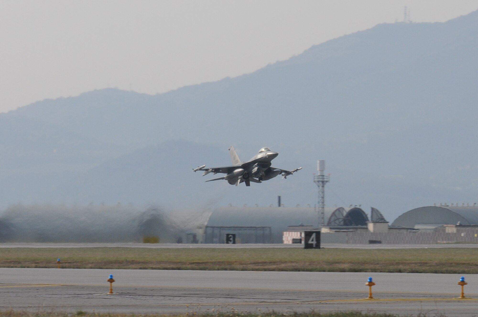 An F-16 Fighting Falcon, assigned to the 510th Fighter Squadron, takes flight during a surge, Dec. 15, 2009 at Aviano Air Base, Italy. The 31st Fighter Wing conducted the surge to test sortie production capability; allowing the wing to push its support functions to the limits, simulate pilot's war-time flying rates, and to help increase flying hours and sorties. The ultimate goal was to generate and fly maximum training sorties within a day.
 (U.S. Air Force photo/ Senior Airman Nadine Y. Barclay)